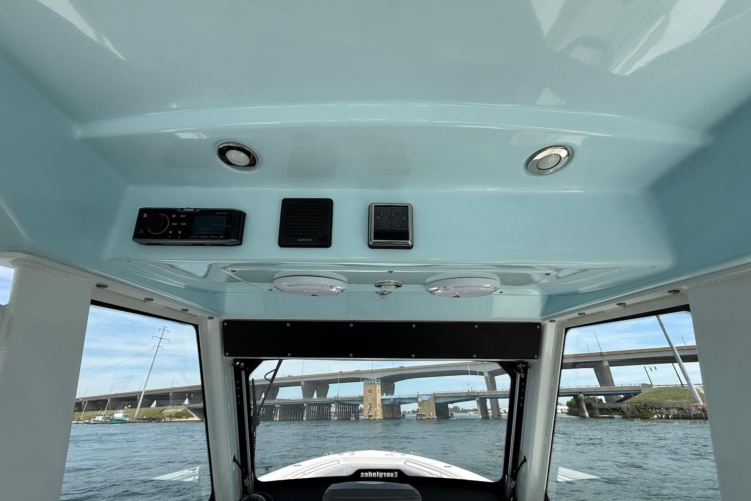 Interior view of 2017 Everglades 355 Center Console boat with electronic controls.