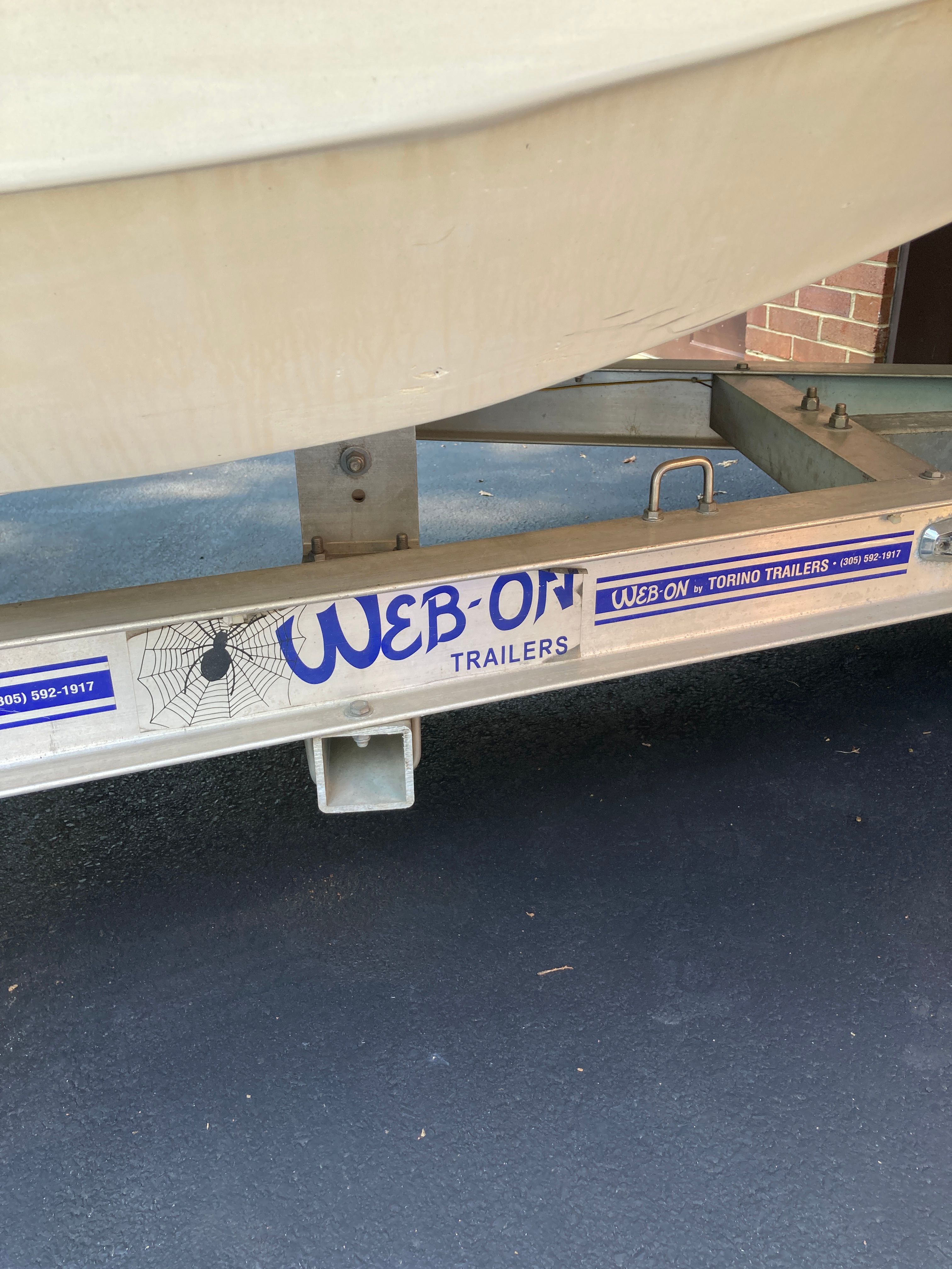 A 2012 Carolina Skiff JVX16CC on a Web-On trailer.