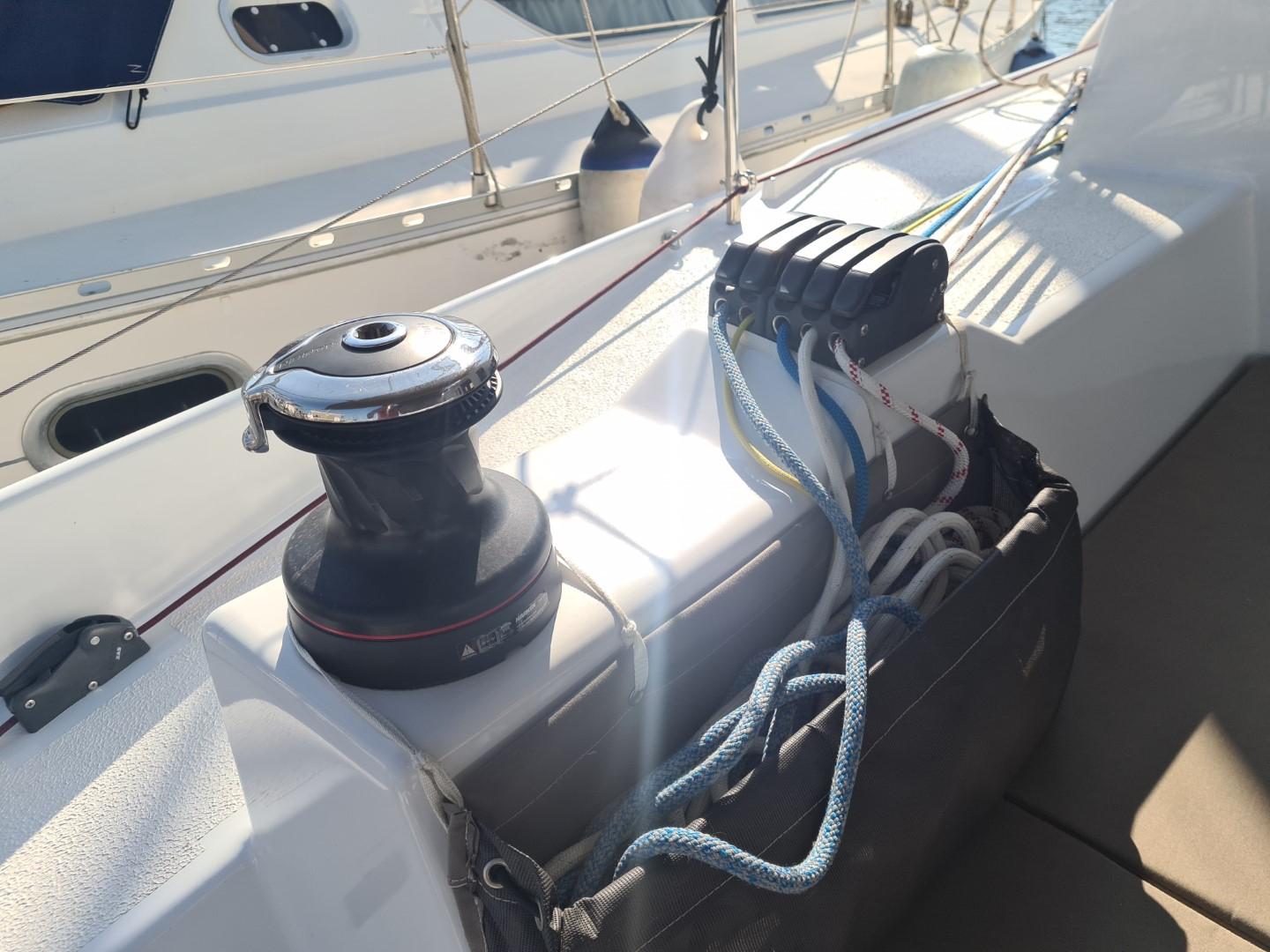 Sailing yacht deck with winch and ropes, JPK JMP 39, 2022 model.