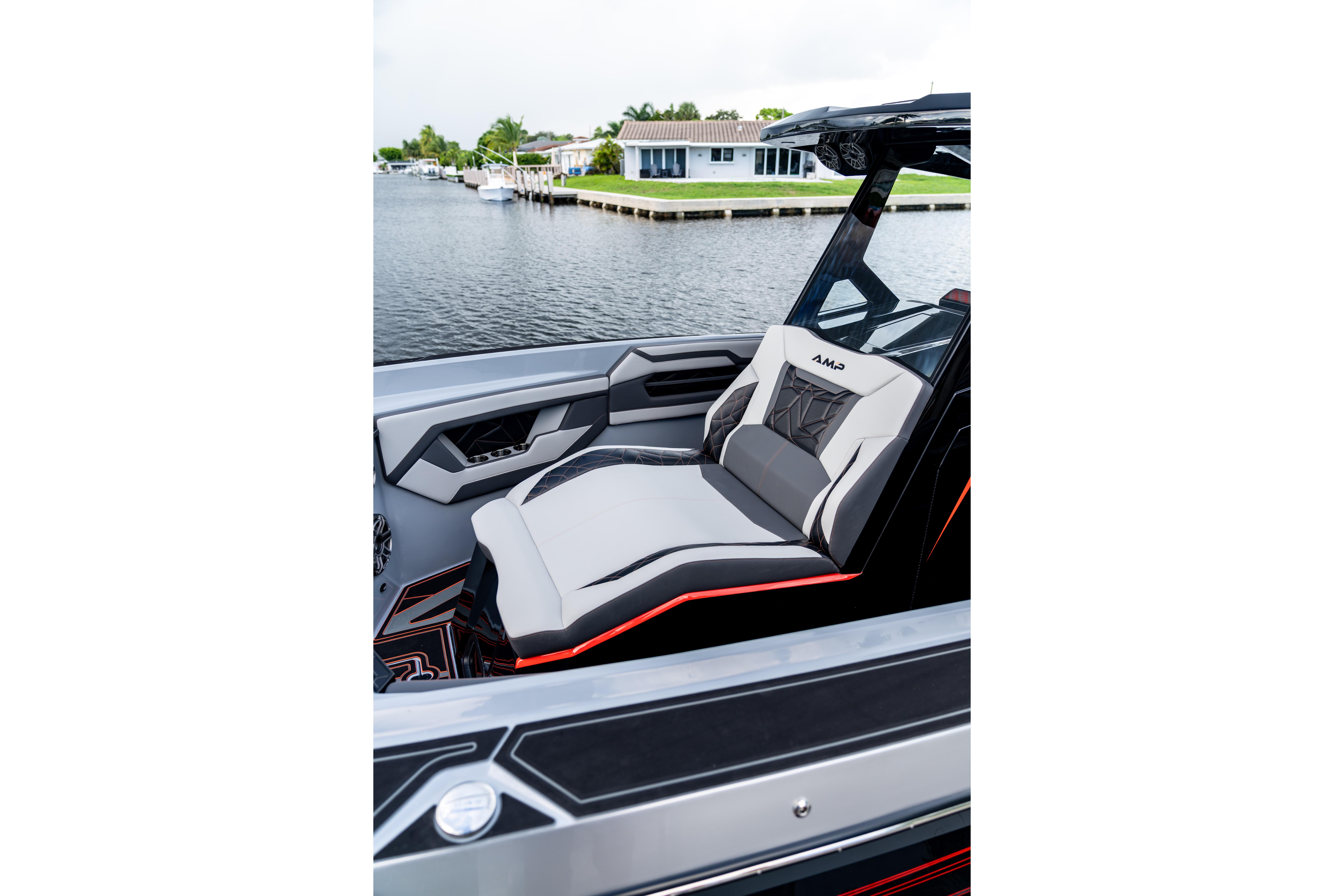Luxury AMP 333 boat interior with sleek seating, modern design, and waterfront view, 2026 model.