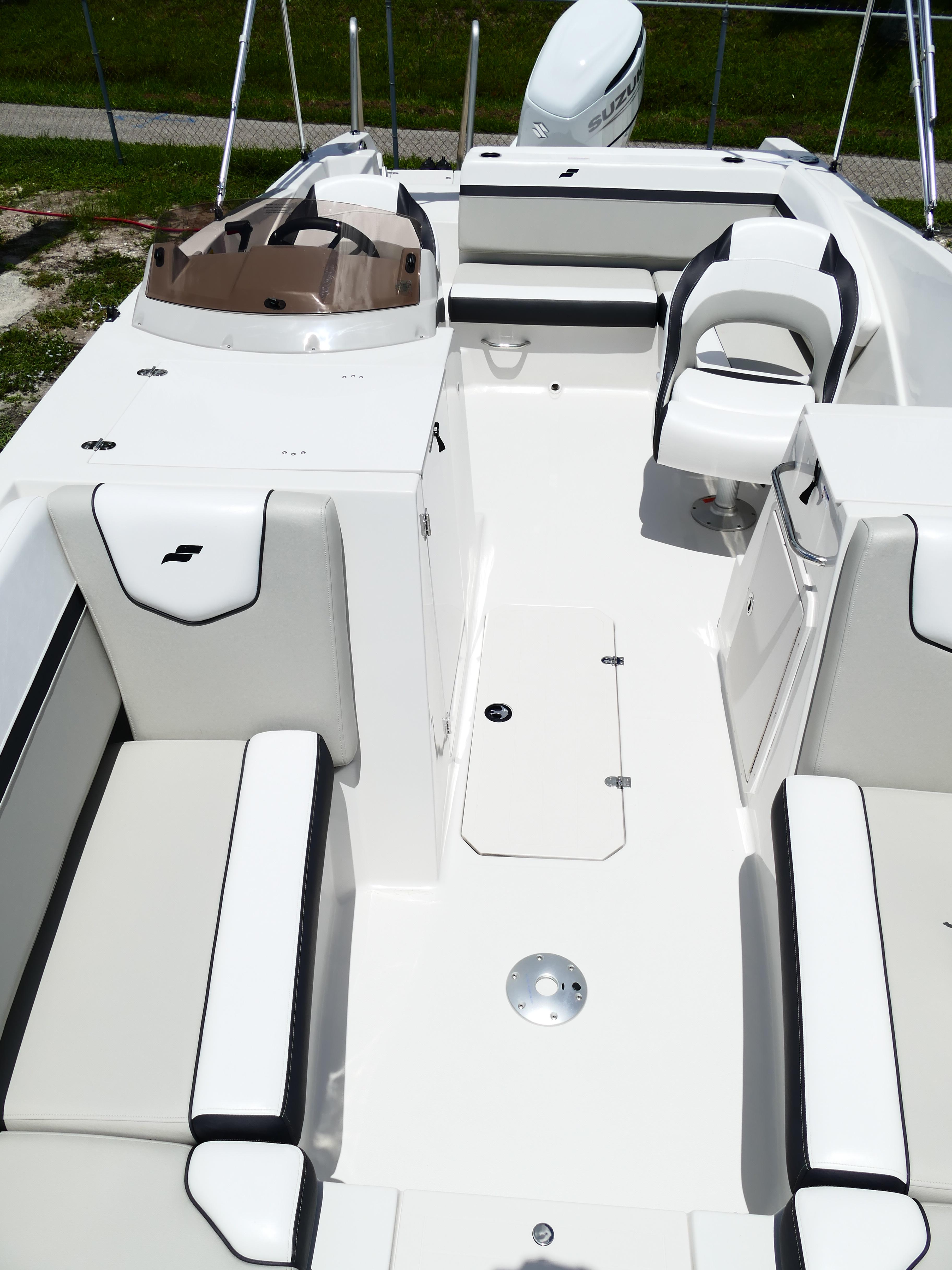 2026 Starcraft SVX 231 OB DH boat interior with white seating and modern design.