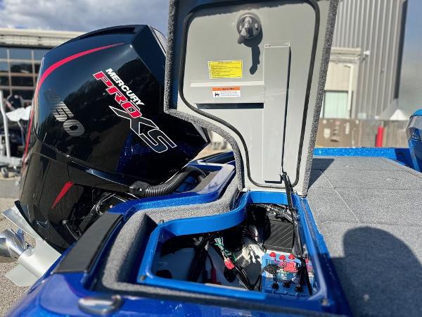 2024 iKon LX 20 boat with Mercury Pro XS engine, open storage compartment.