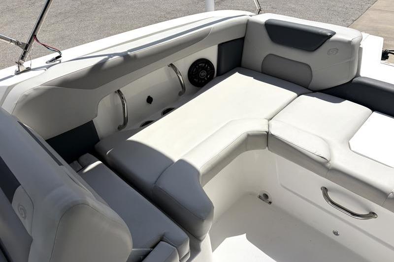 2026 Hurricane SunDeck Sport 2050 OB boat interior with cushioned seating and sleek design.
