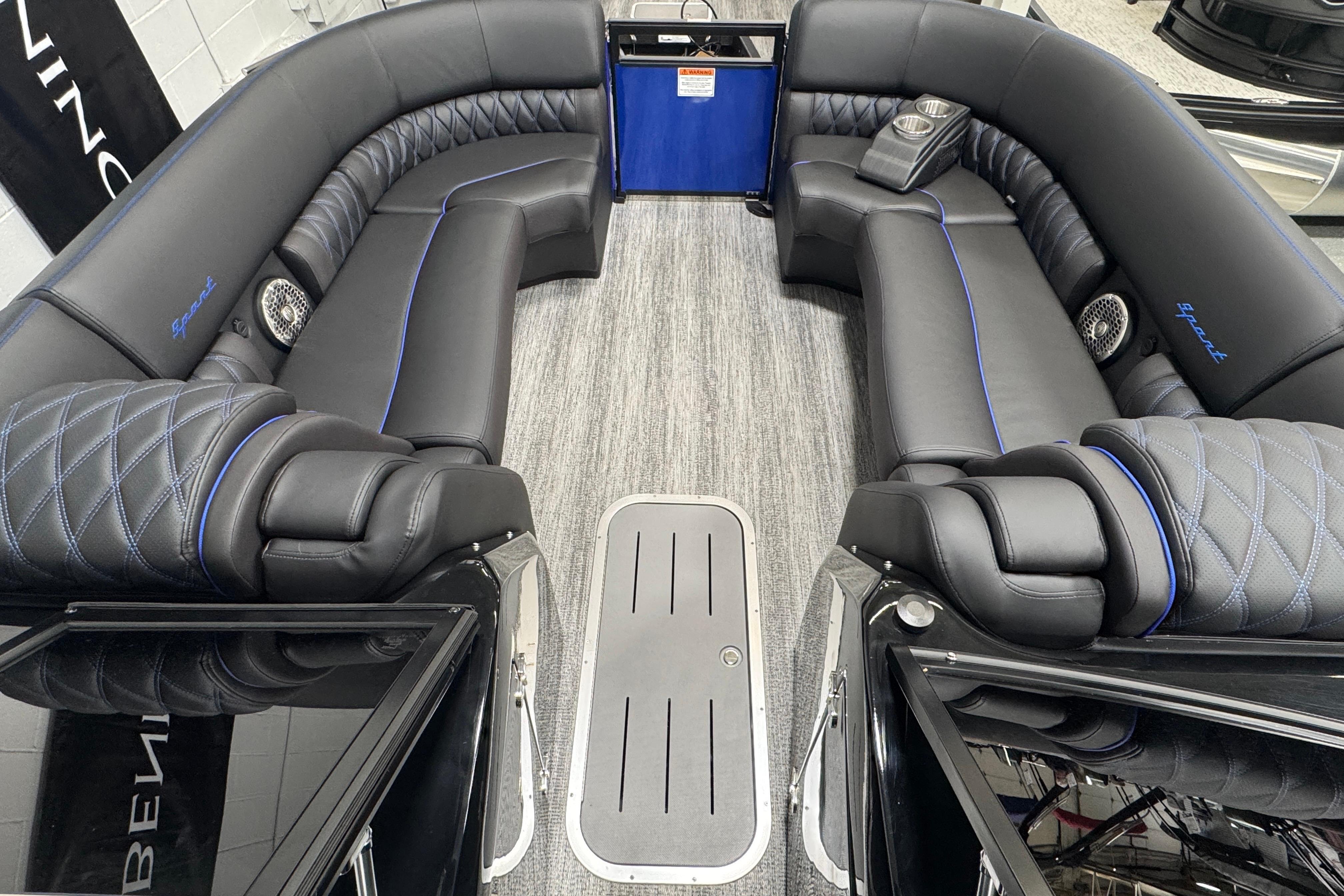 Luxurious interior of 2026 Bennington 25 QSBWASE pontoon boat with plush seating.