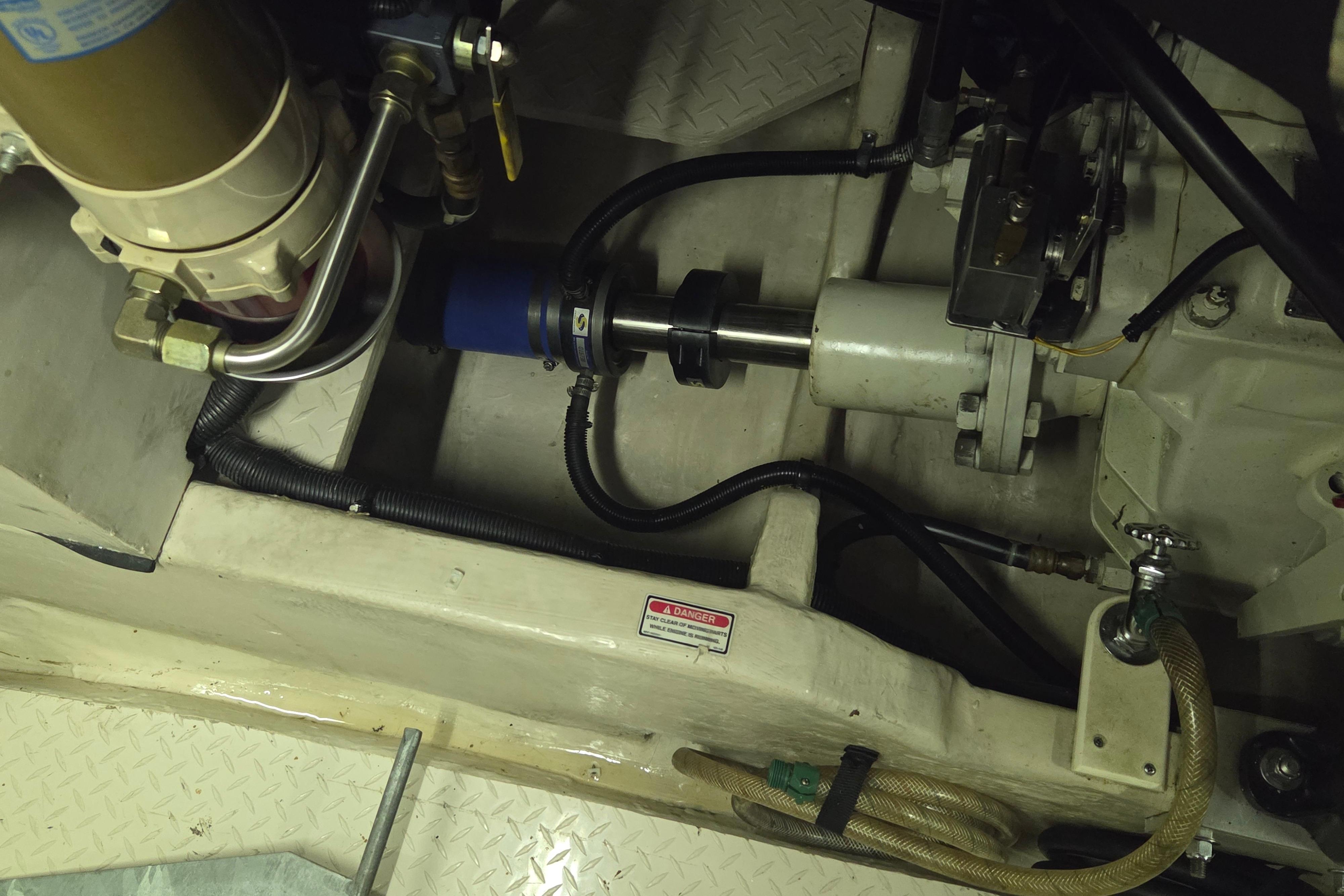 Engine compartment of a 2000 Sea Ray Sundancer 540 boat, showing mechanical components.
