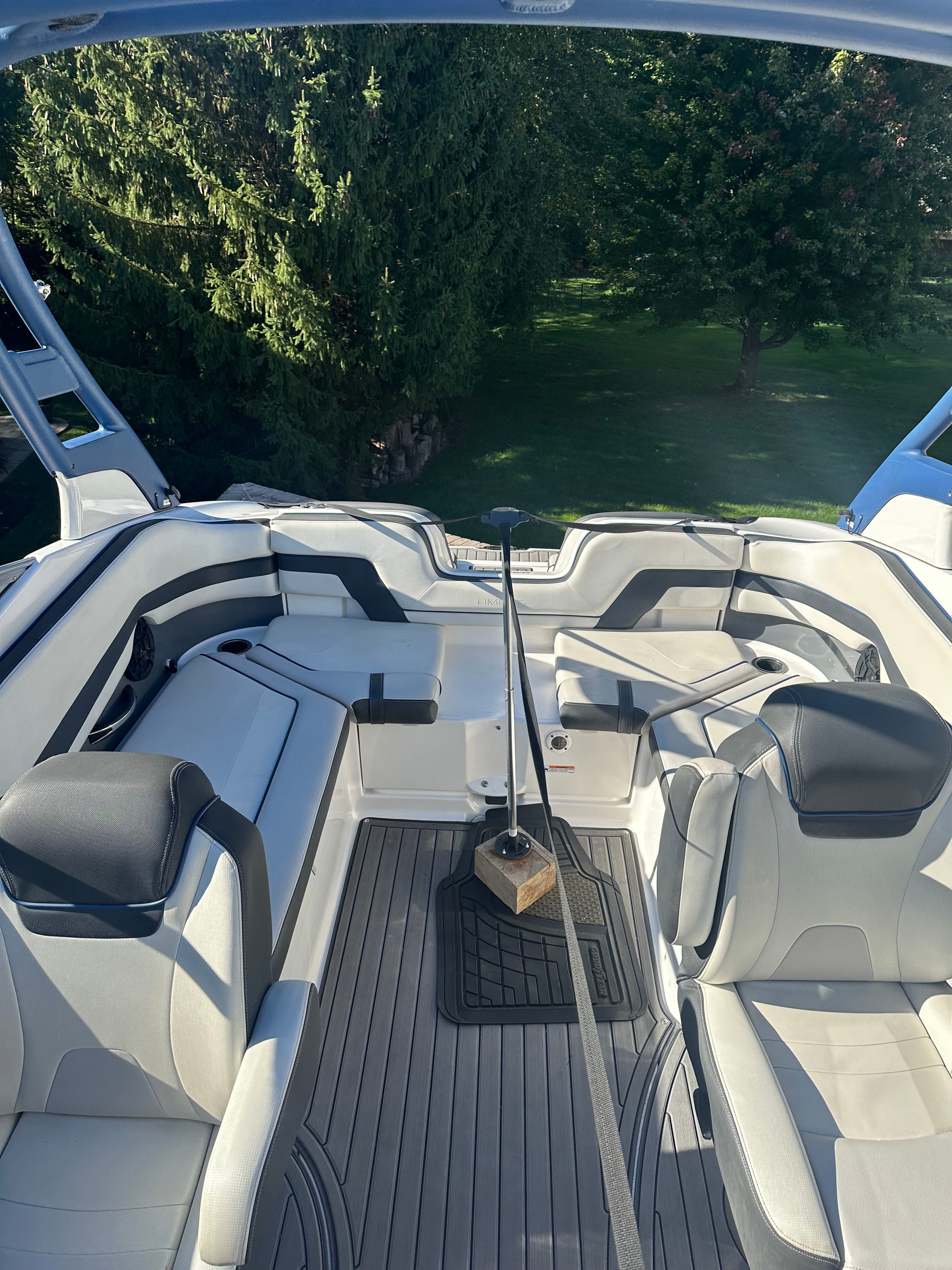 Interior of a 2018 Yamaha 242 Limited S with gray and black seating.