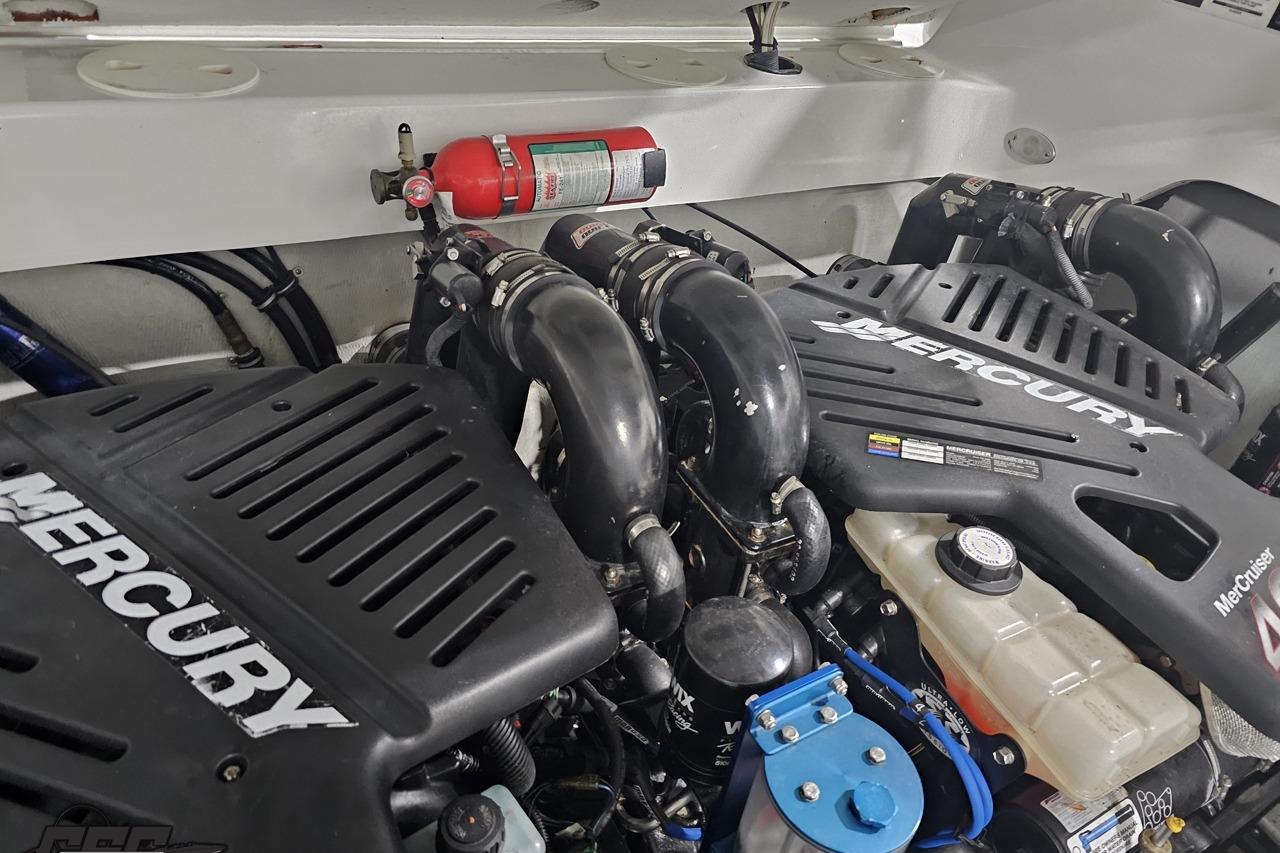 Engine compartment of a 2008 Baja 335 Performance boat with Mercury engines.