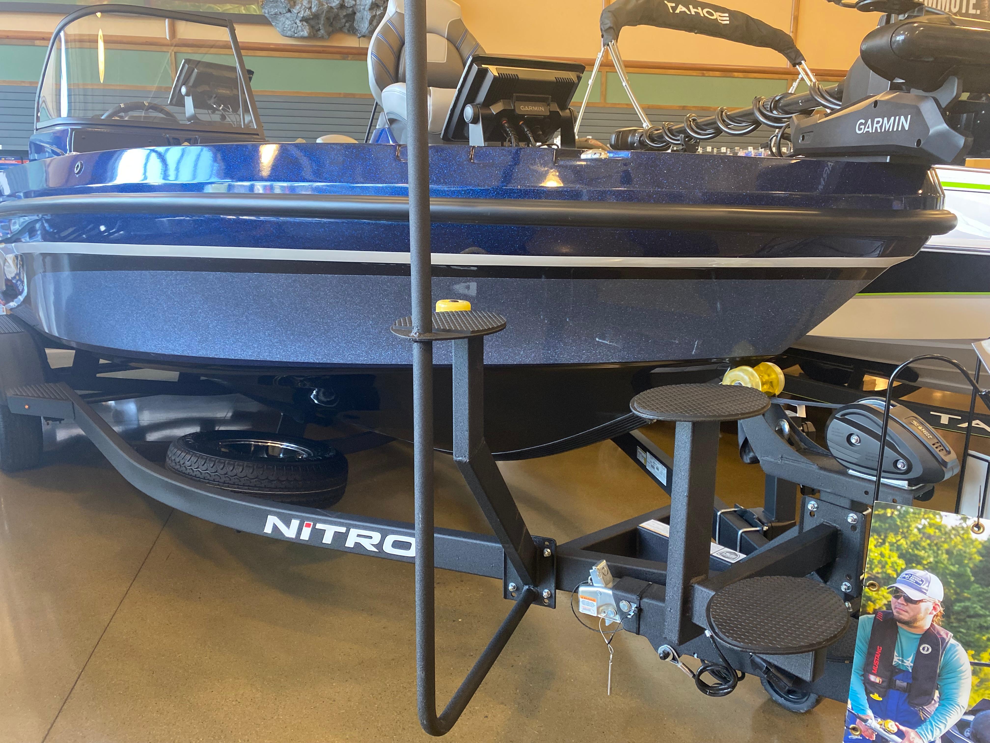 2025 Nitro ZV20 Pro boat on display with Garmin equipment and trailer.