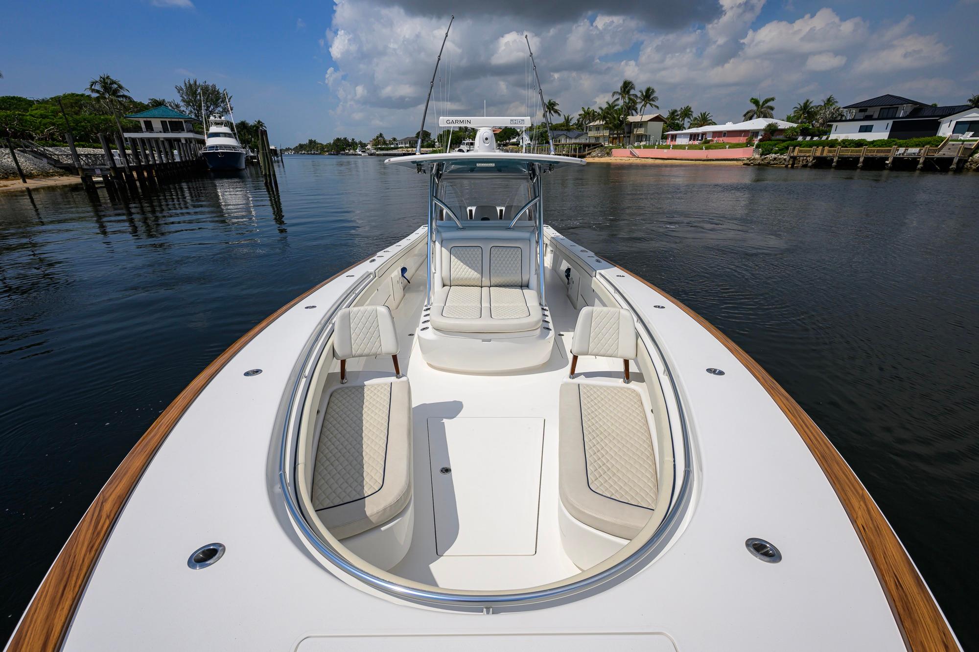 2020 Valhalla Boatworks V-41 on calm water, showcasing spacious deck and seating.