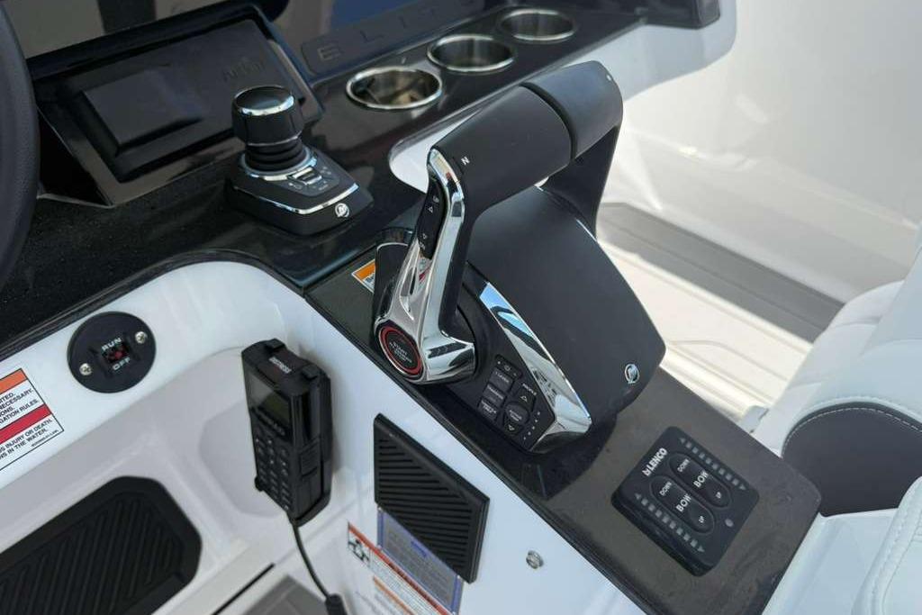 Control panel of 2026 Monterey Elite 30 OB boat with joystick and throttle.