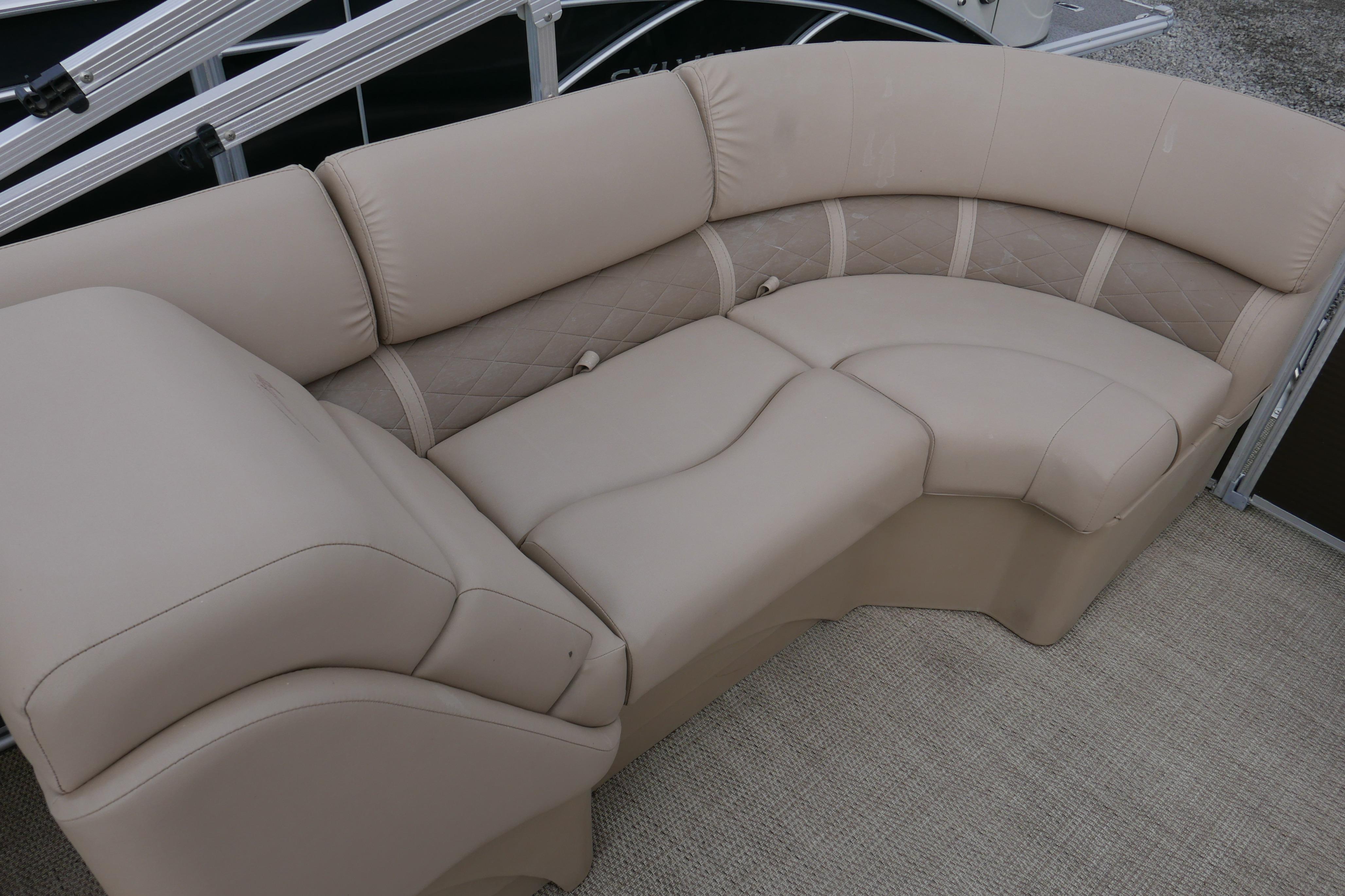 Beige seating on 2018 Bennington 22 SSRX pontoon boat, featuring quilted upholstery design.