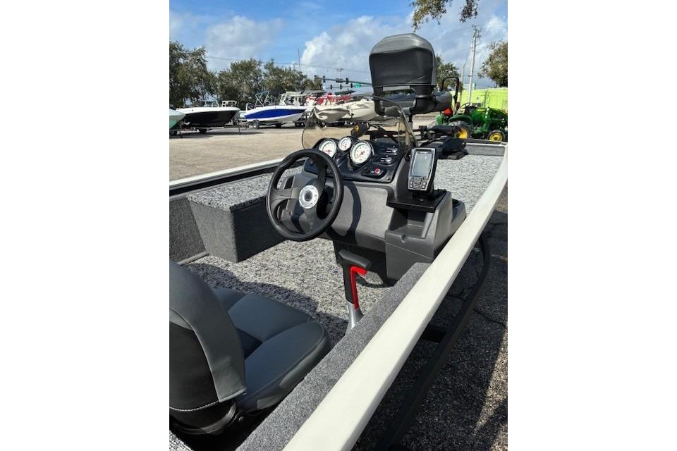 2026 Tracker Pro 170 boat interior with steering wheel and dashboard controls.