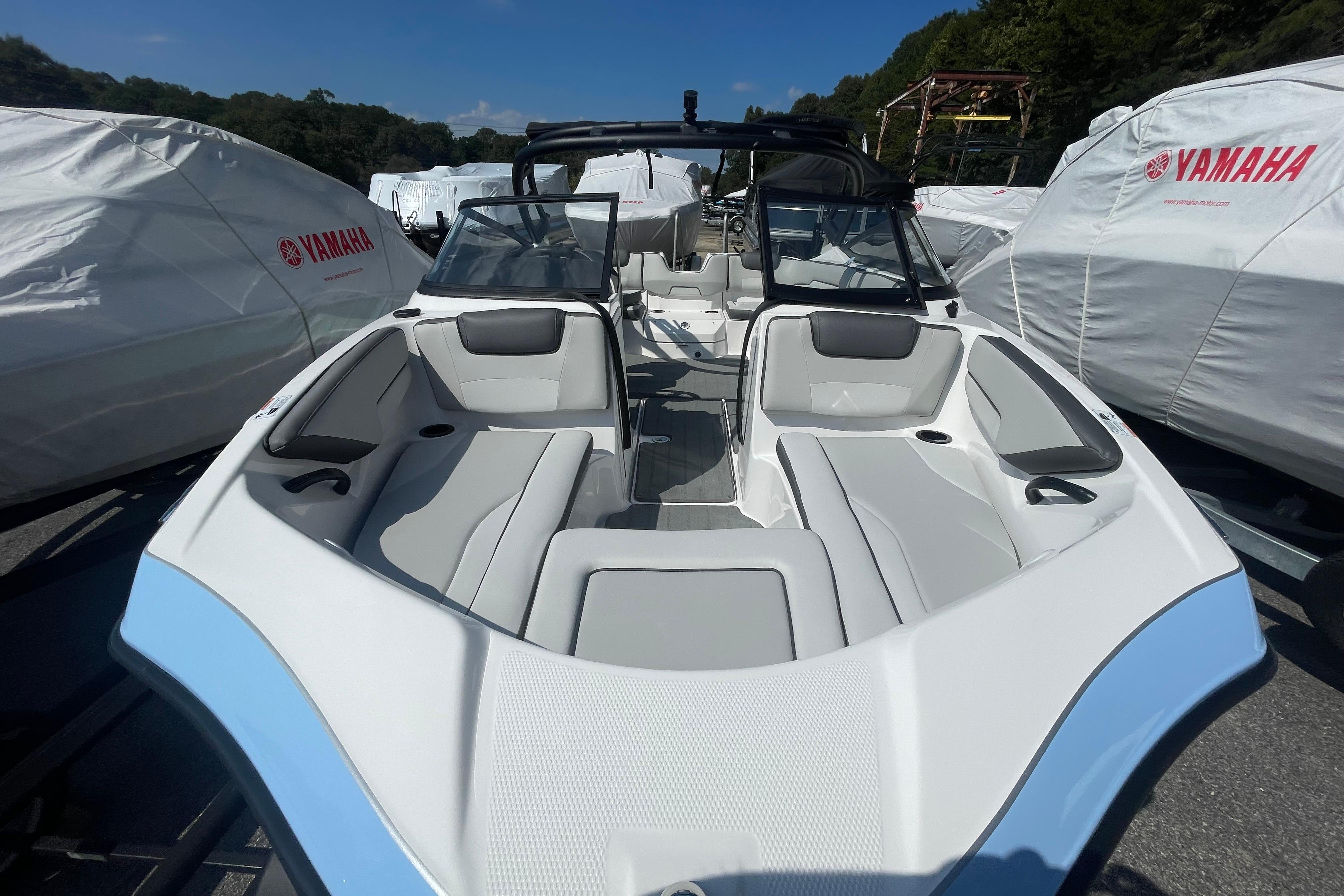 2026 Yamaha AR190 boat with sleek interior design, parked outdoors.
