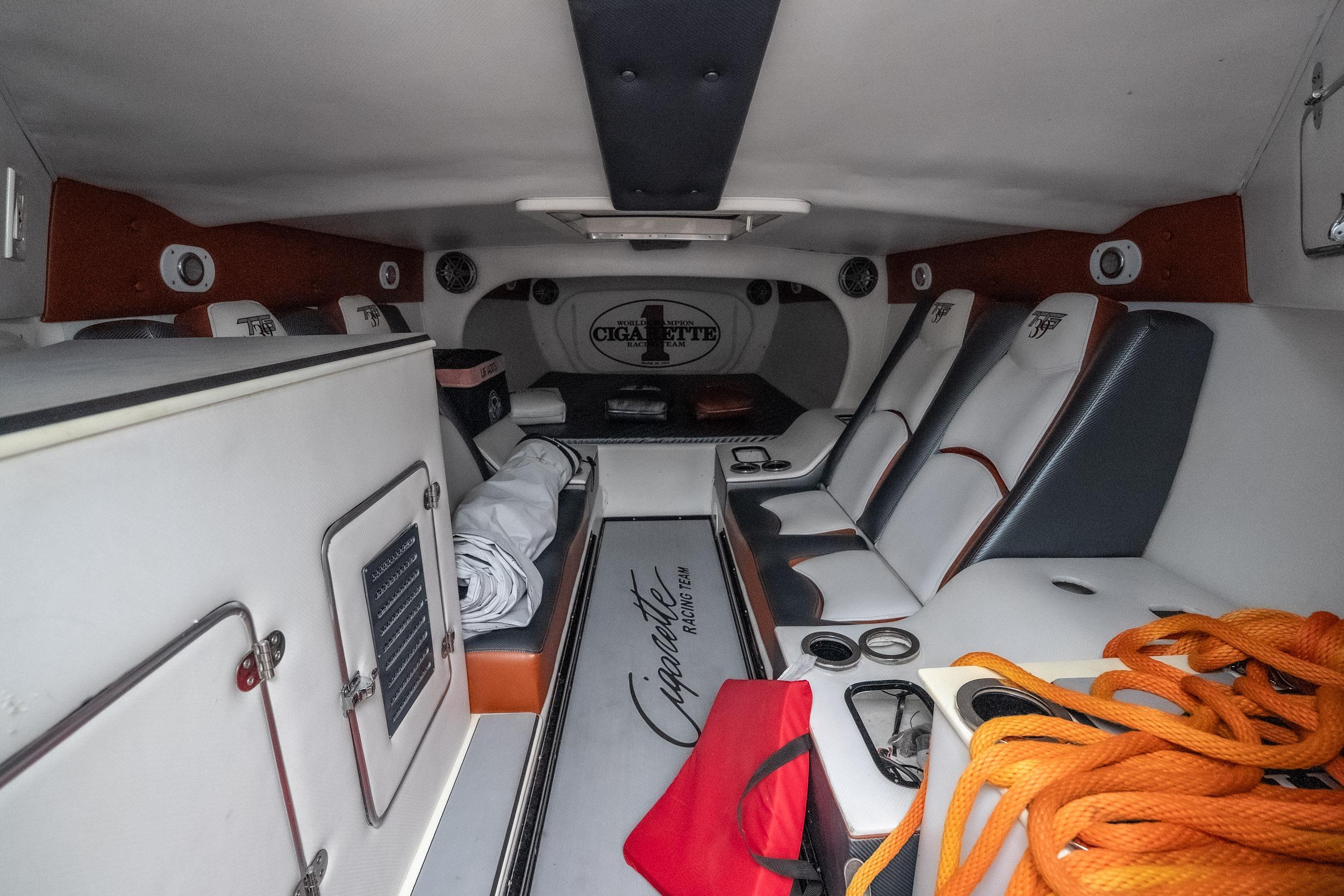 Interior of 2006 Cigarette 39' Top Gun Unlimited boat with seating and storage.