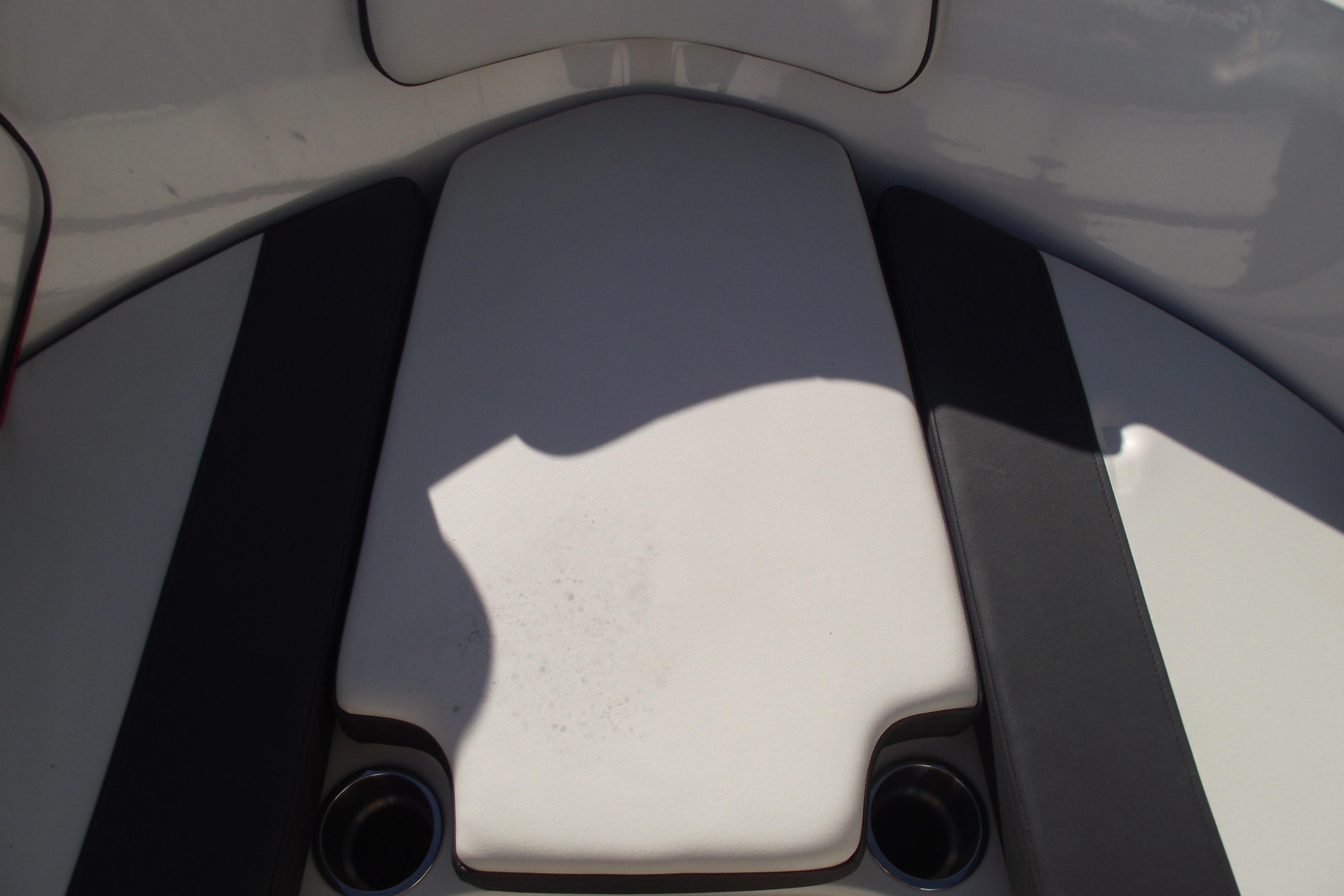 2022 Bayliner VR4 Bowrider OB boat interior with cushioned seating and cup holders.