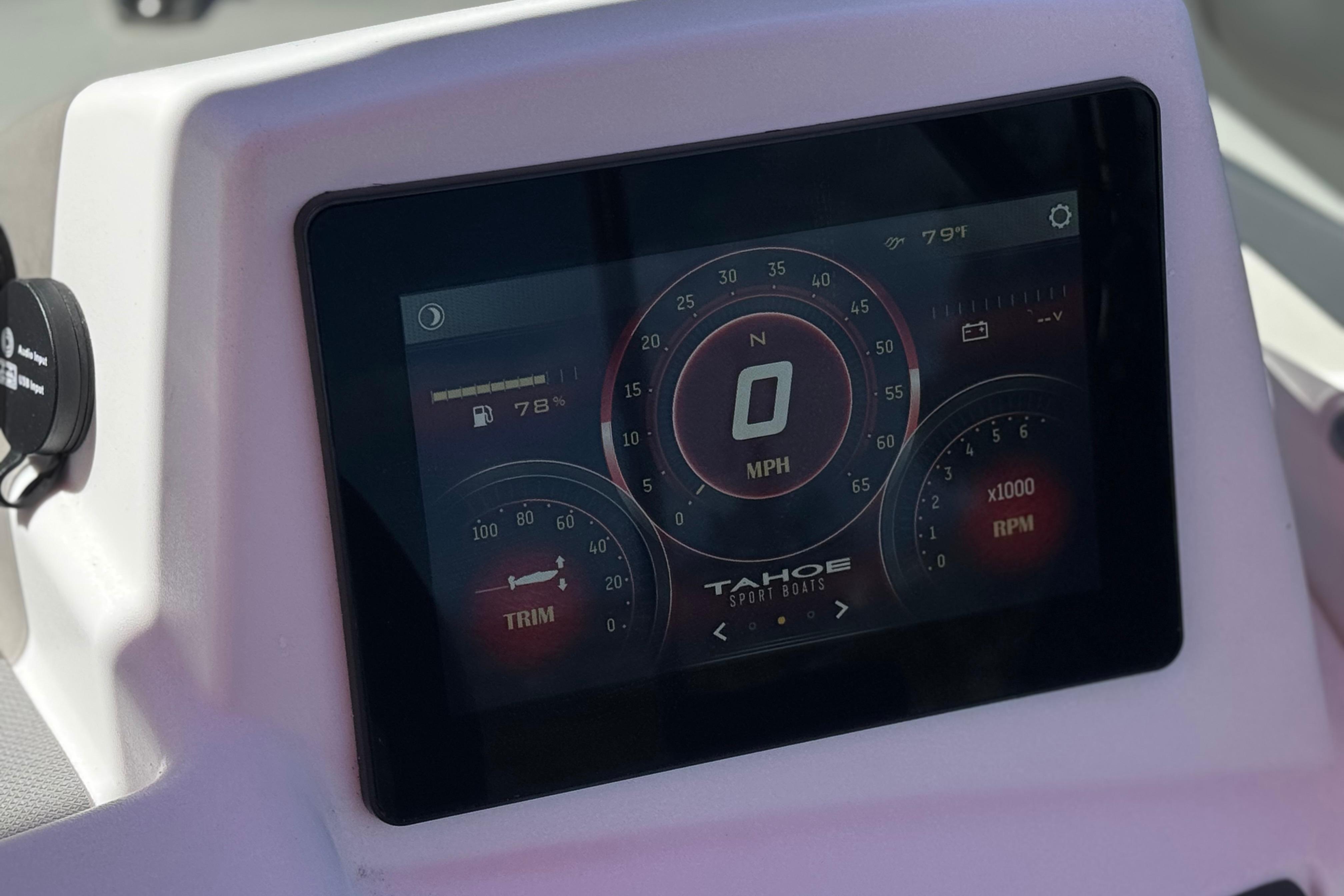 2024 Tahoe T16 dashboard display showing speed, RPM, and fuel level.