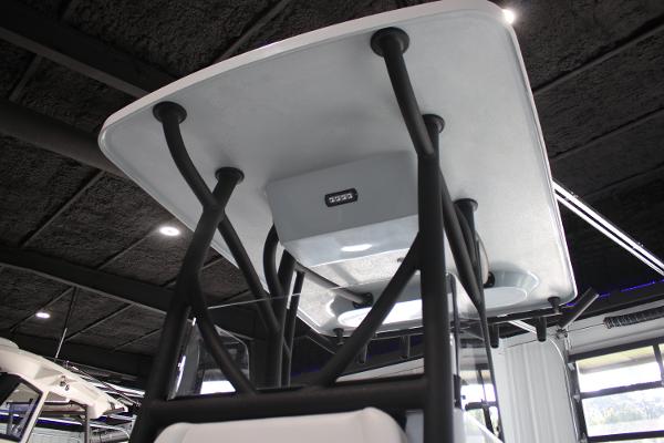 2025 East Cape 25 Open boat with sturdy T-top and modern design.