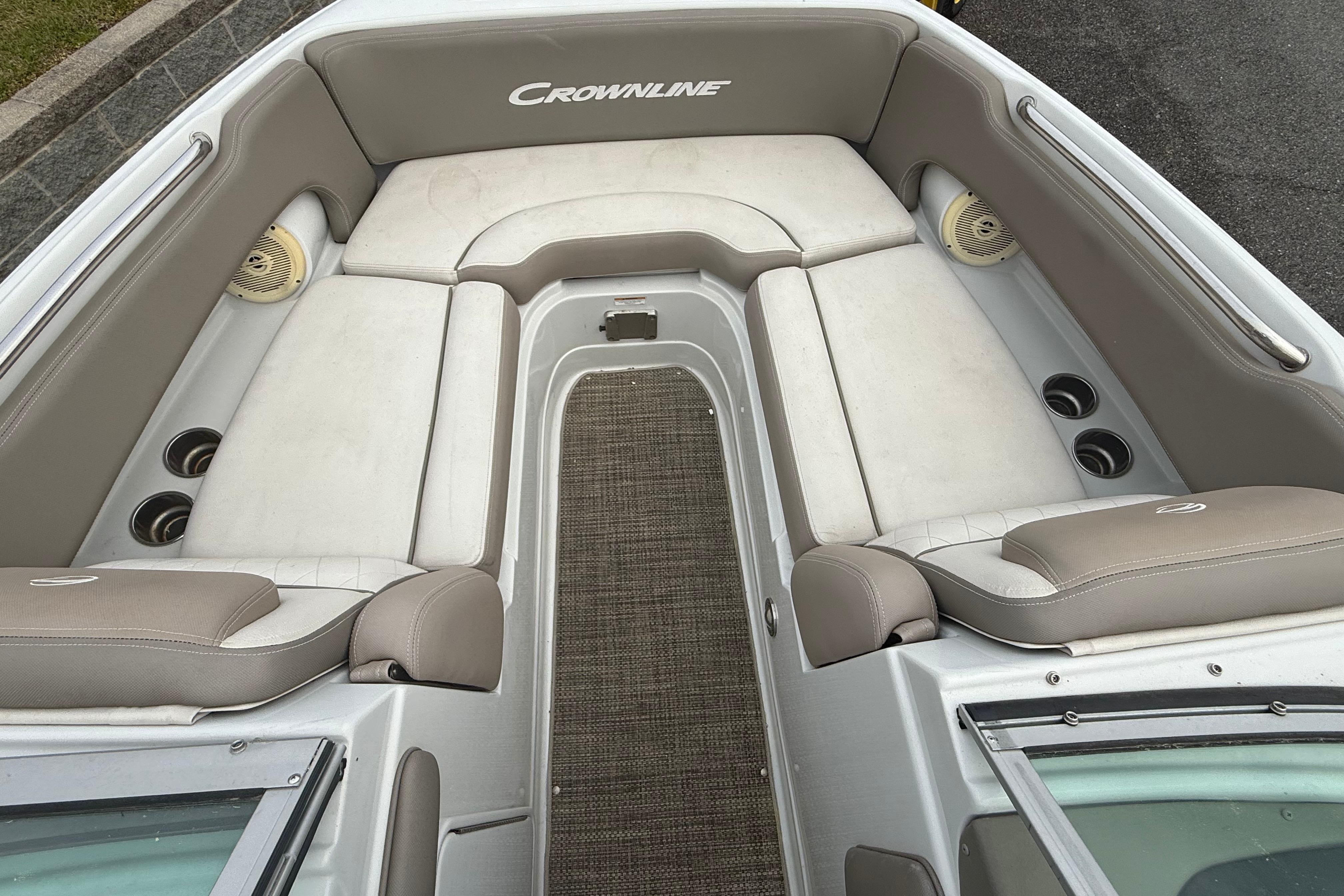 2017 Crownline Eclipse E1 XS boat interior with cushioned seating and cup holders.