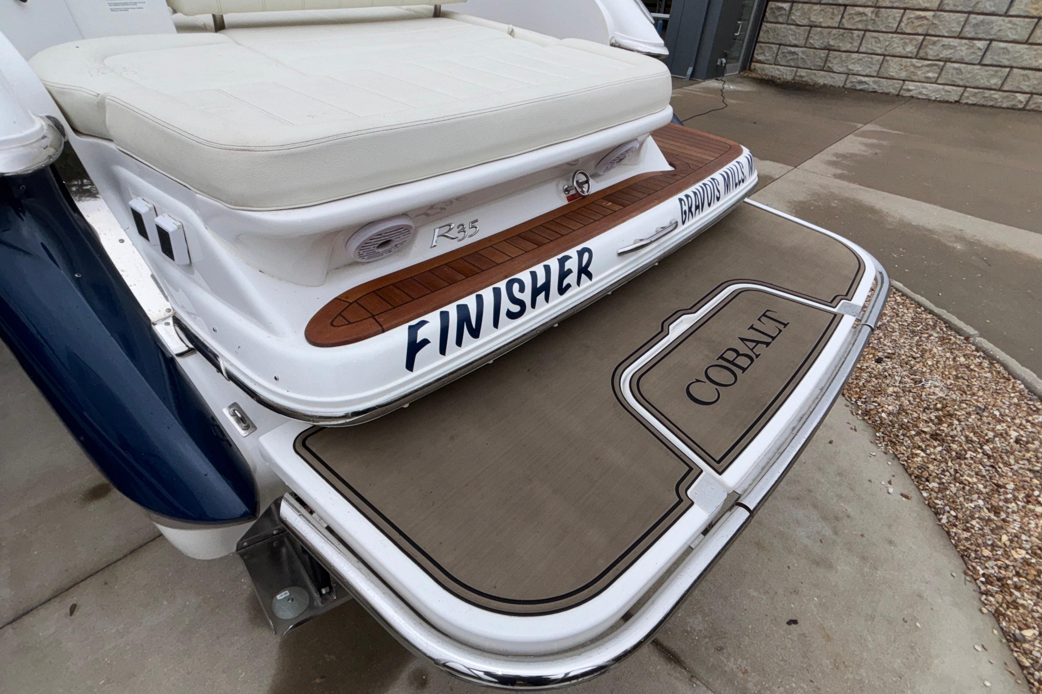 2022 Cobalt R35 boat with "Finisher" branding on the deck.
