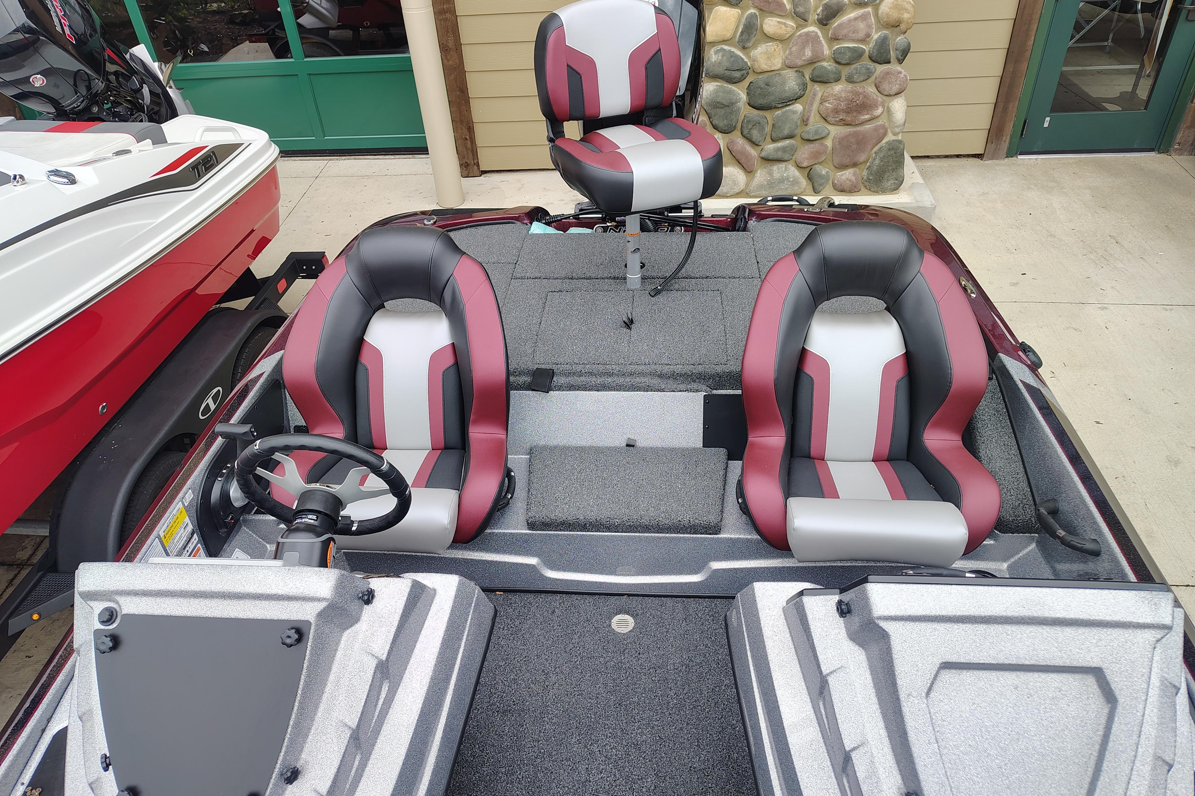 2026 Nitro Z18 Pro boat interior with stylish seats and modern steering wheel design.
