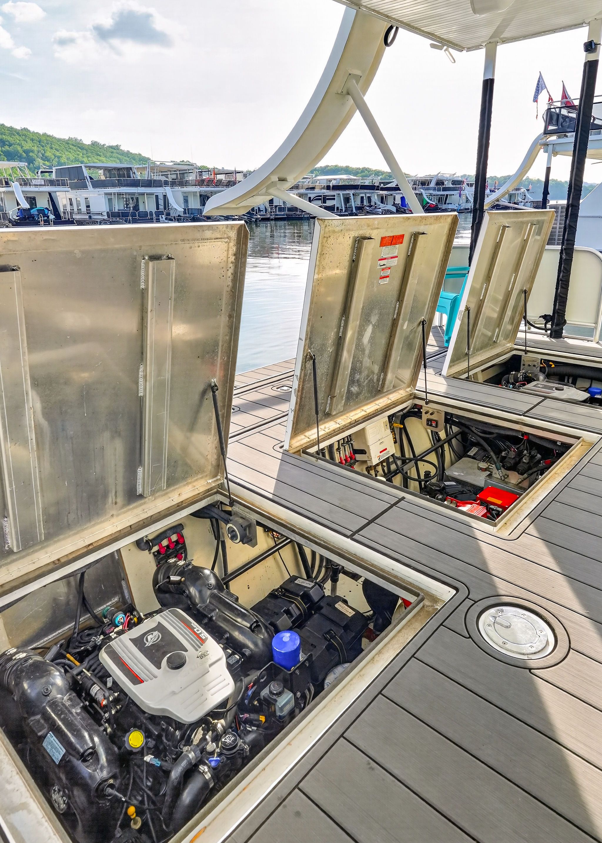 Engine compartment of a 2010 Houseboat Thoroughbred at the dock.