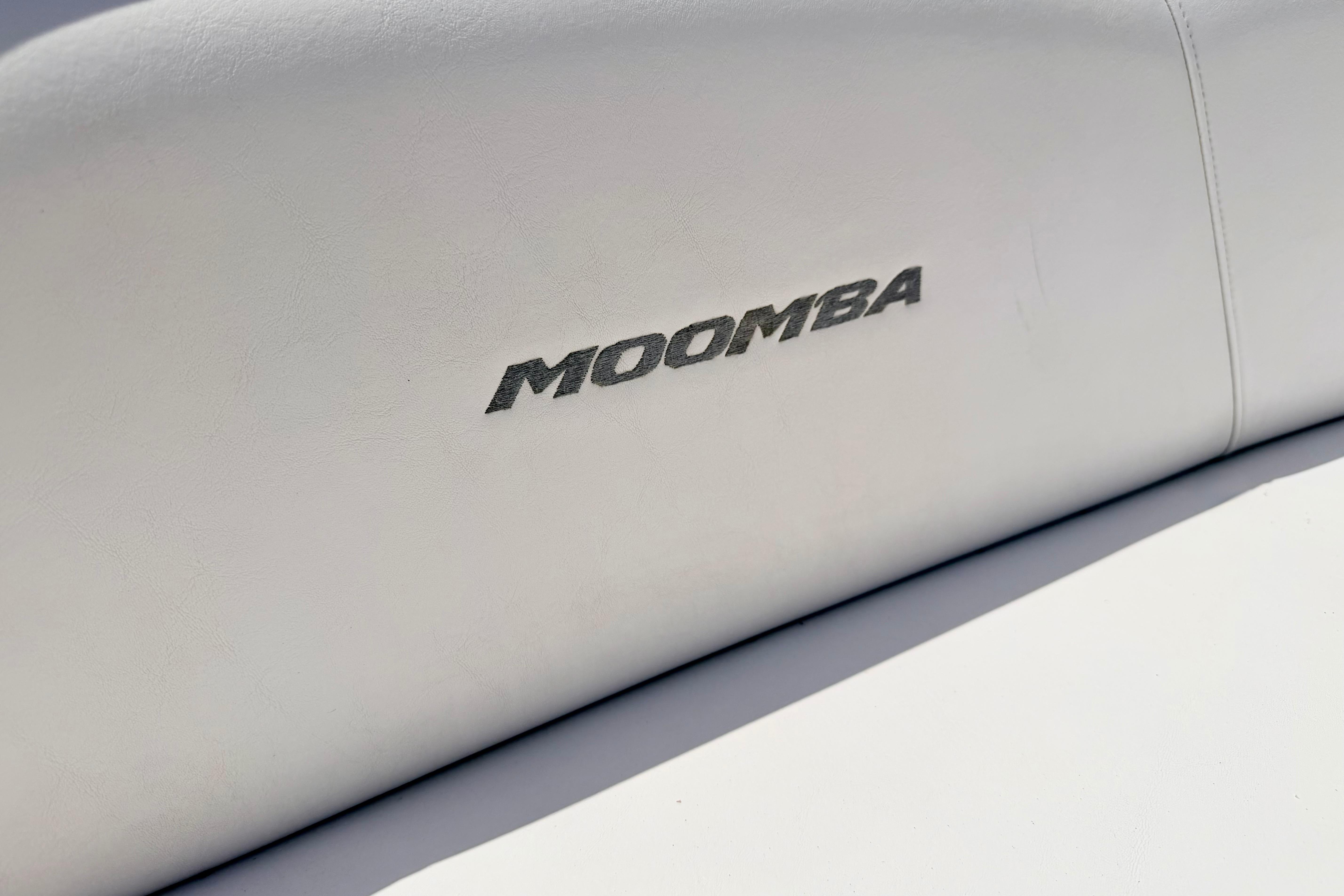 2008 Moomba Outback V boat seat with logo, white upholstery.