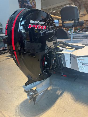 2025 Tracker Savage 215 with Mercury Pro XS outboard motor in showroom.