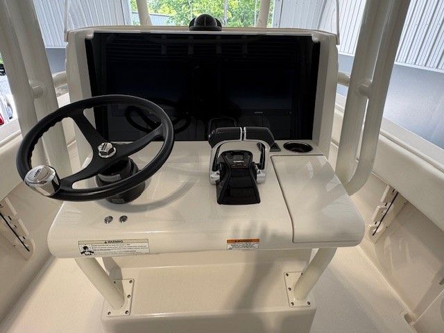 Helm of a 2020 Jupiter 26 FS Center Console boat.