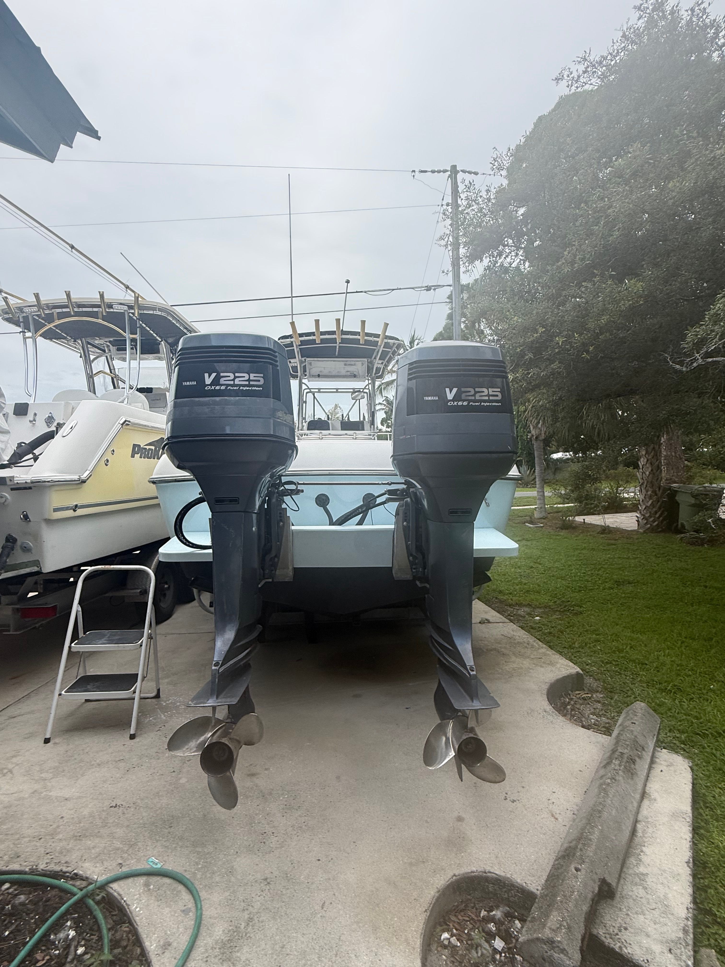Rear view of a Hydra-Sports Vector 2550 cc with two outboard engines.