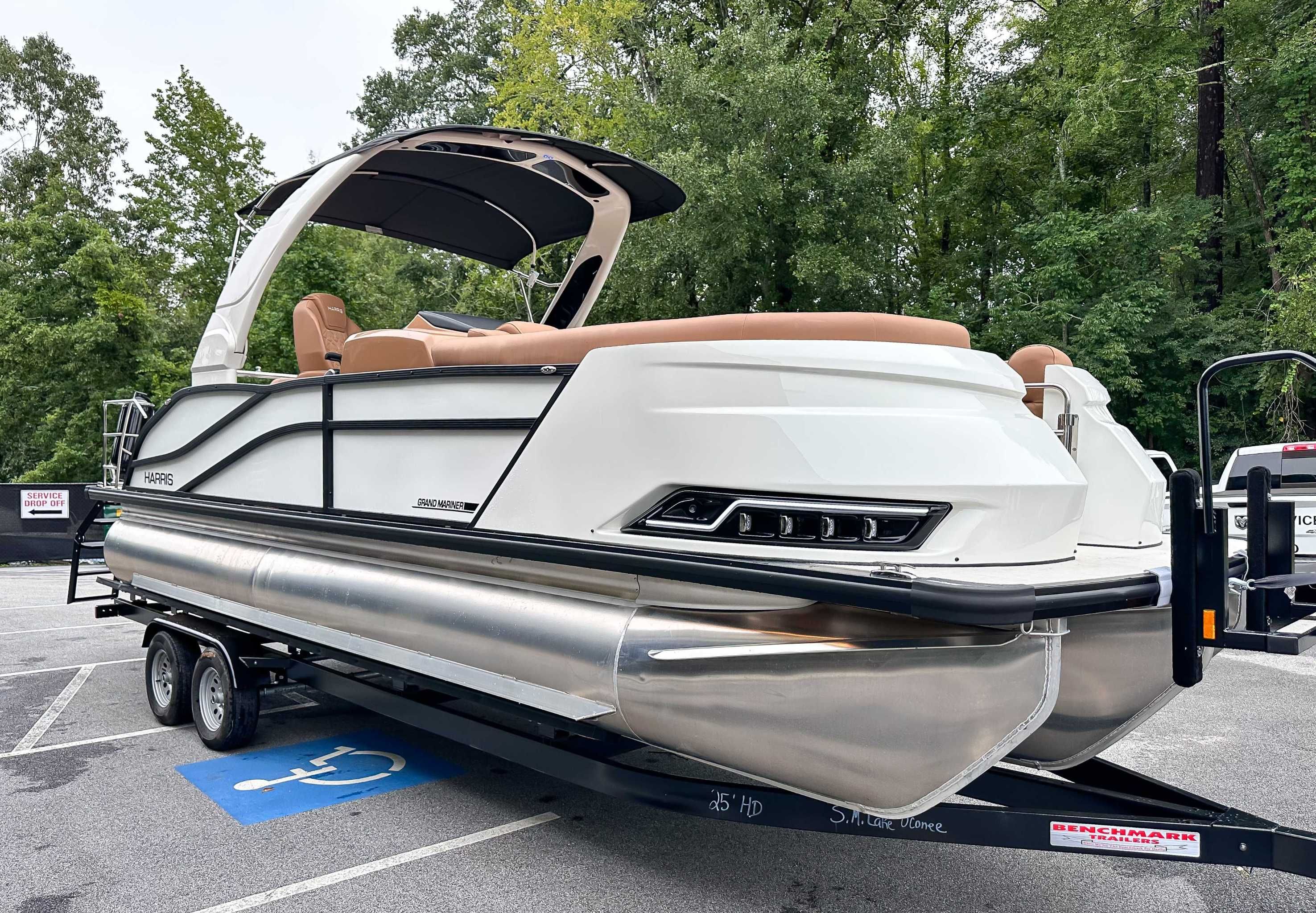 2025 Harris Grand Mariner 230 SLDH pontoon boat on trailer.