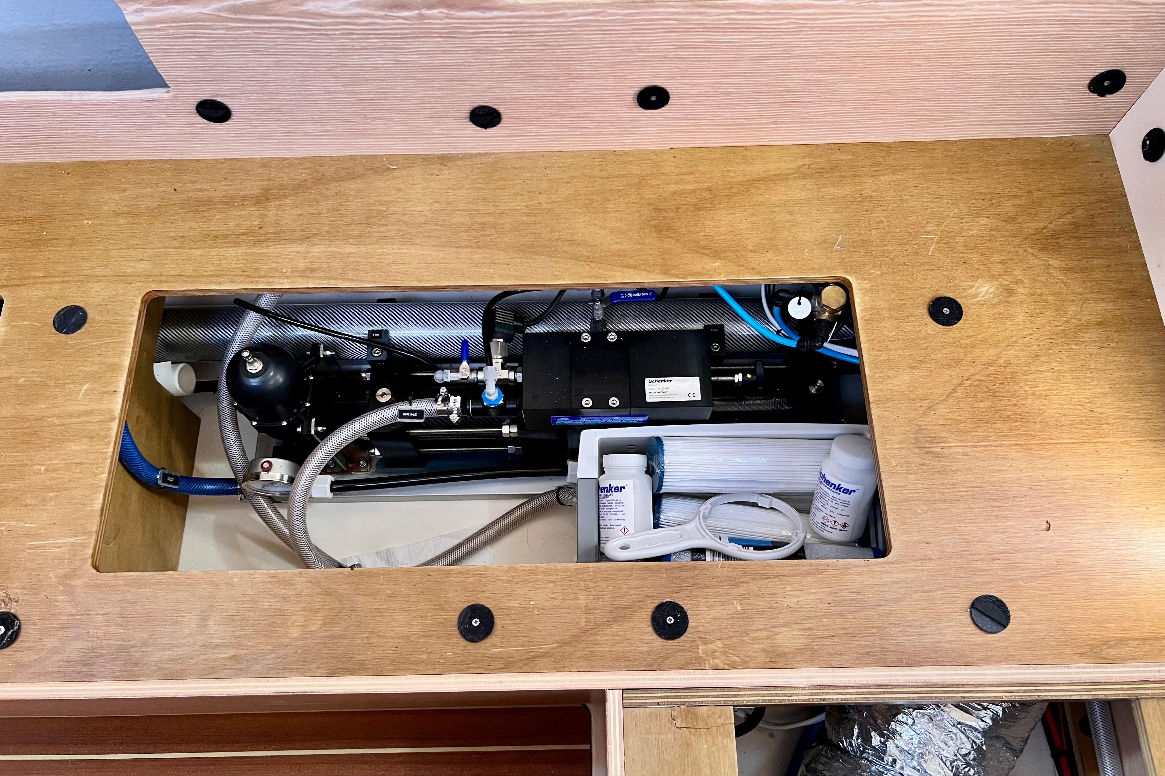 Interior view of a 2016 Hanse 455 yacht's technical compartment with equipment and wiring.