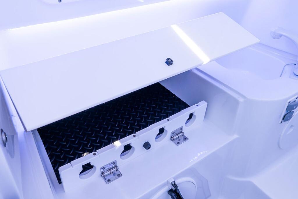 2026 Sea Hunt Gamefish 28 Coffin Box interior with storage compartment and sleek design.