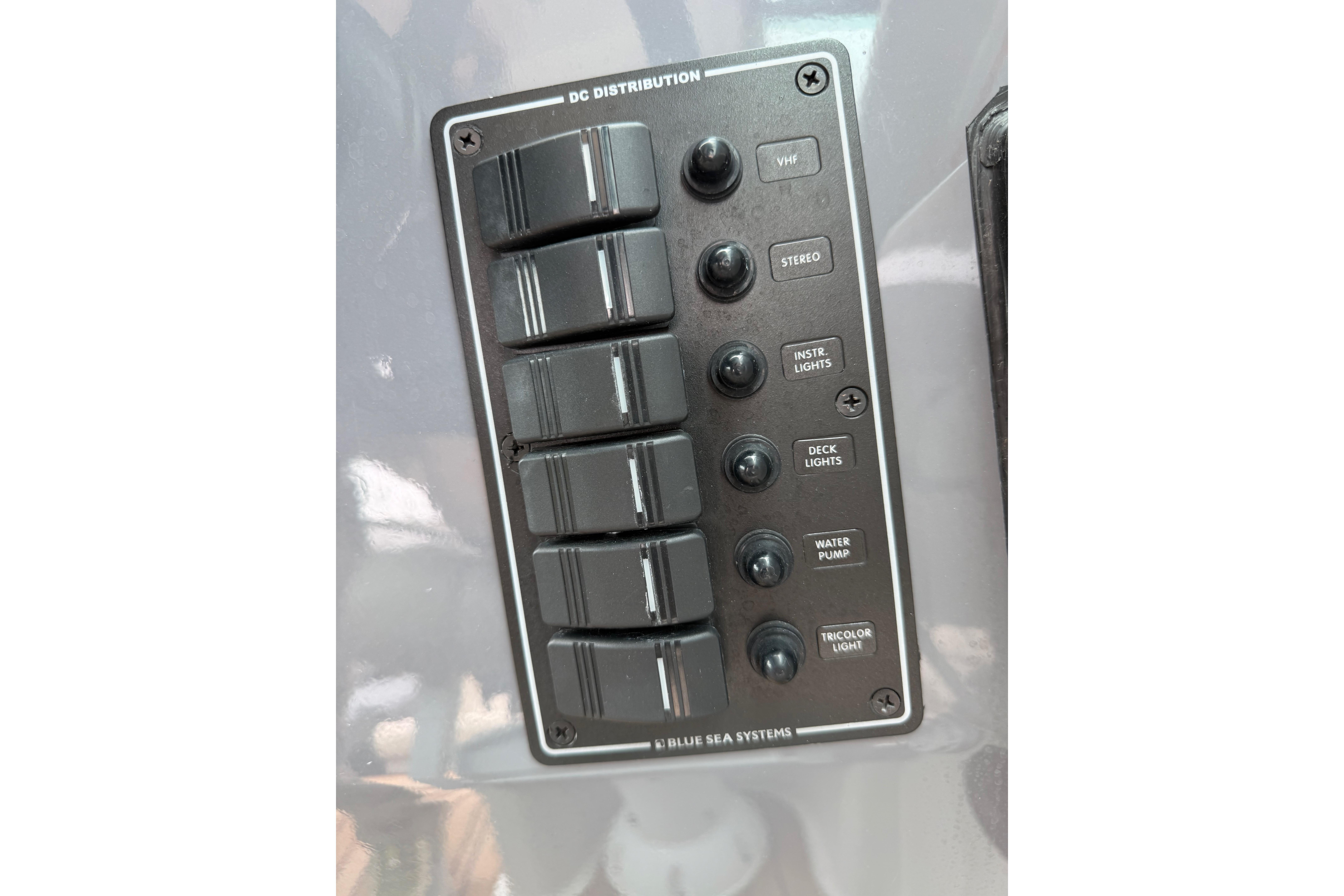 Control panel of a 2016 Protector Targa 30 boat with labeled switches.