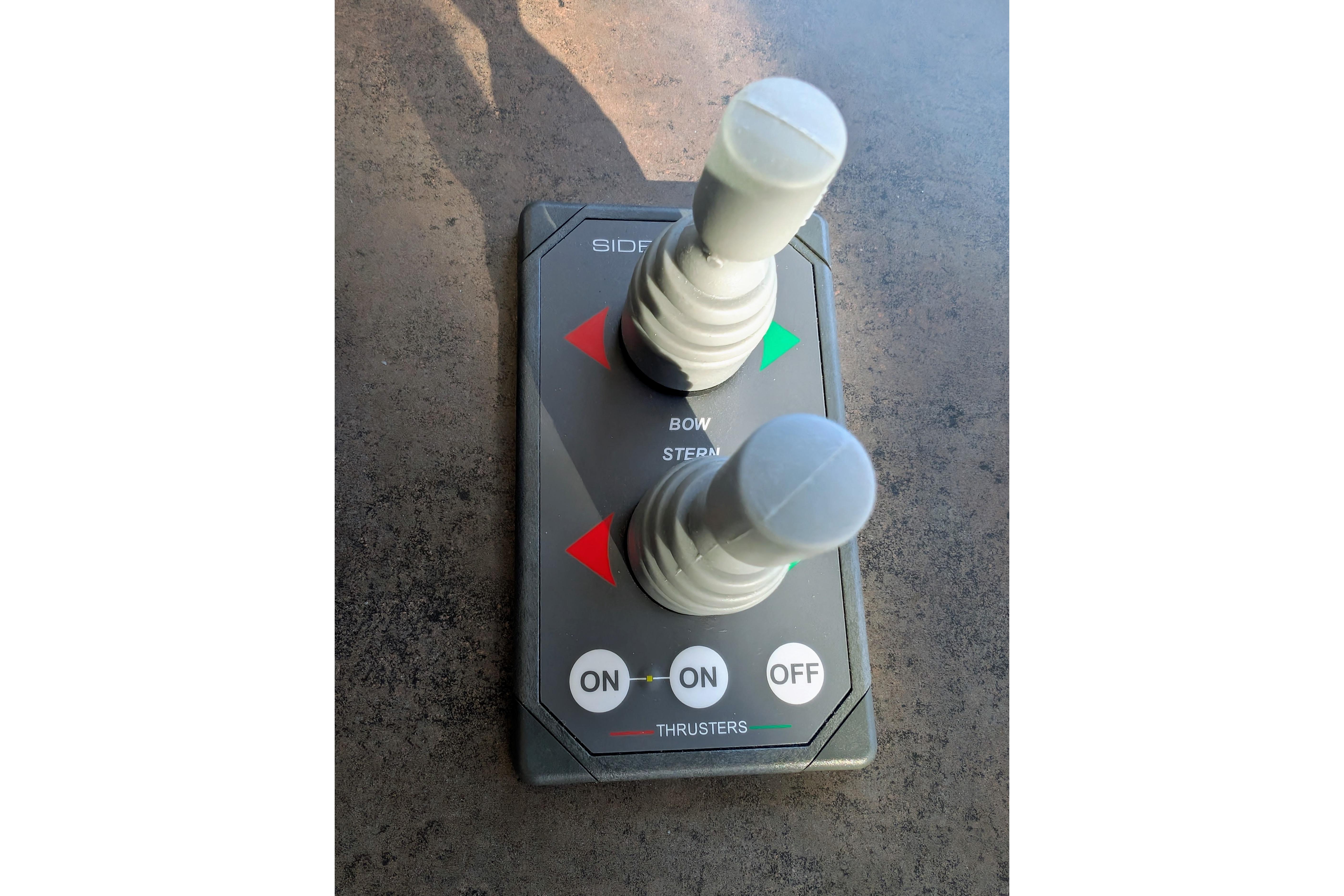 Joystick controls for bow and stern thrusters on a 2015 American Tug 435.