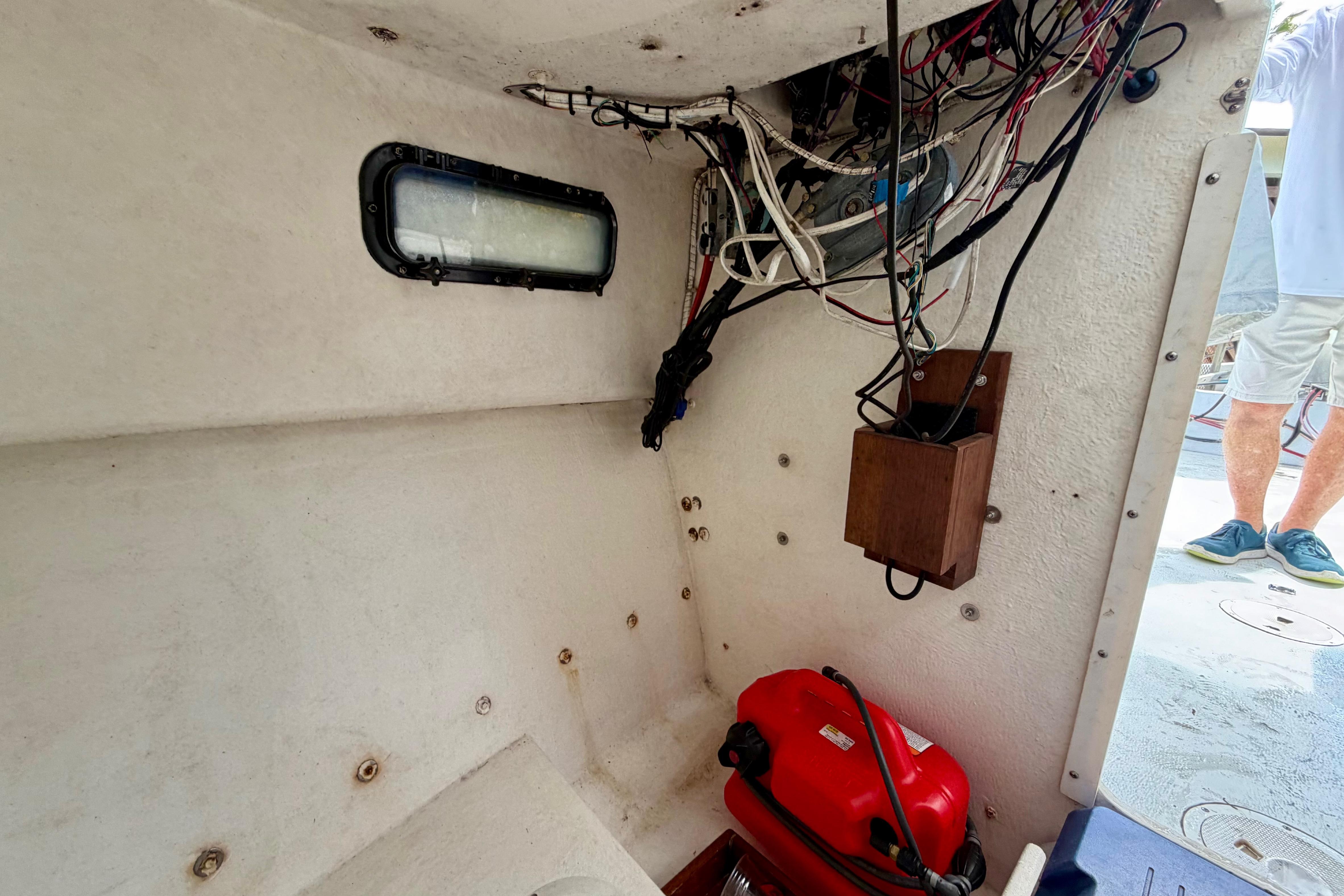 Interior view of a 2000 Eastern 22 Lobster Fisherman boat, showing wiring and equipment.