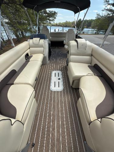 2022 Premier 250 Solaris pontoon boat with spacious seating and elegant interior design.