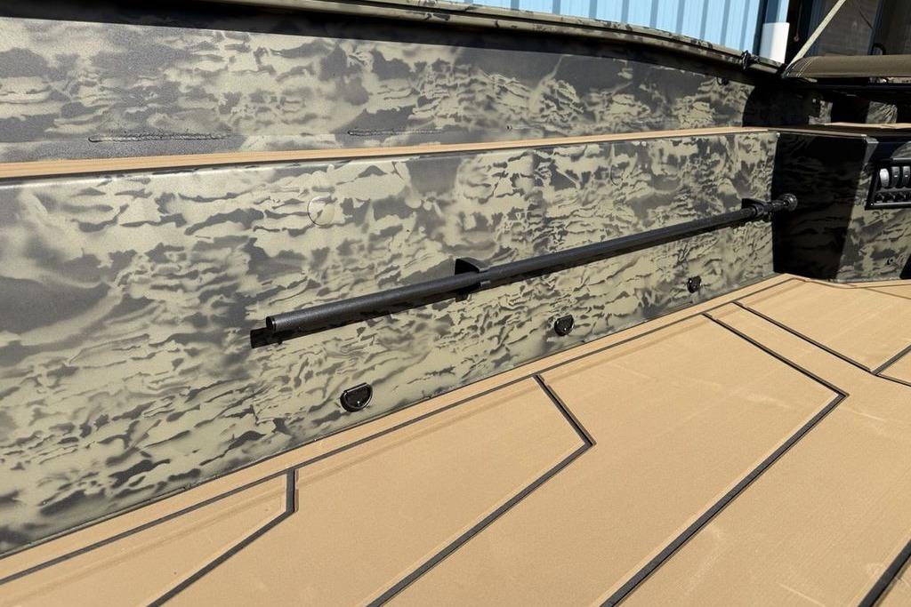2026 Tracker Grizzly 1650 T Prairie Wings Edition boat interior with camouflage design.