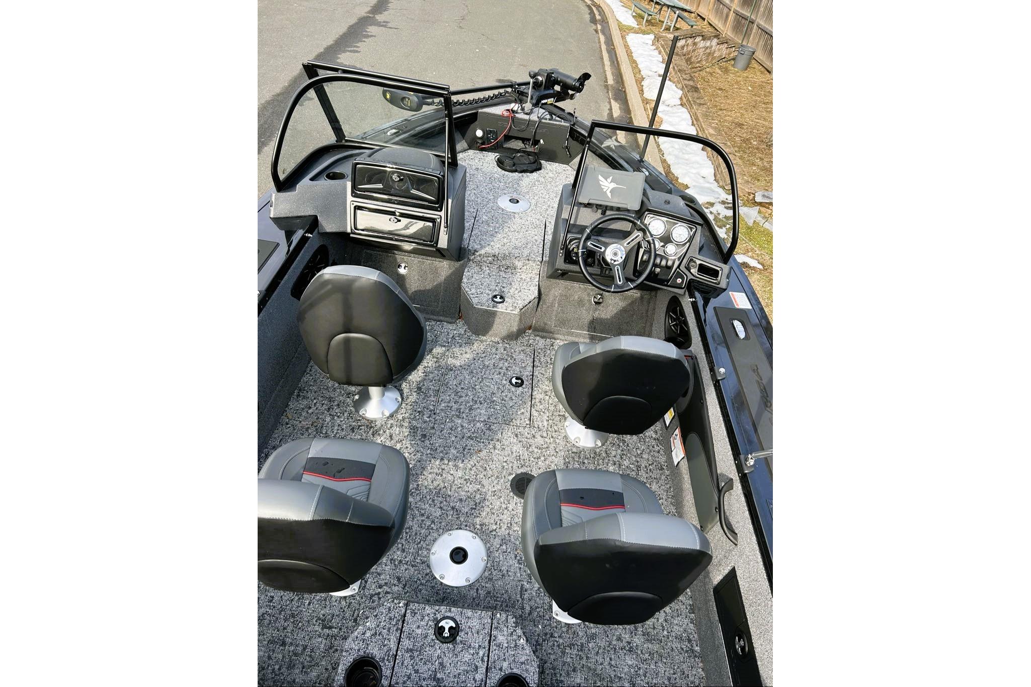 2026 Tracker Targa V-18 Combo boat interior with four seats and steering console.