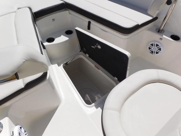 2024 Sailfish 242 CC boat interior with storage compartment and seating.