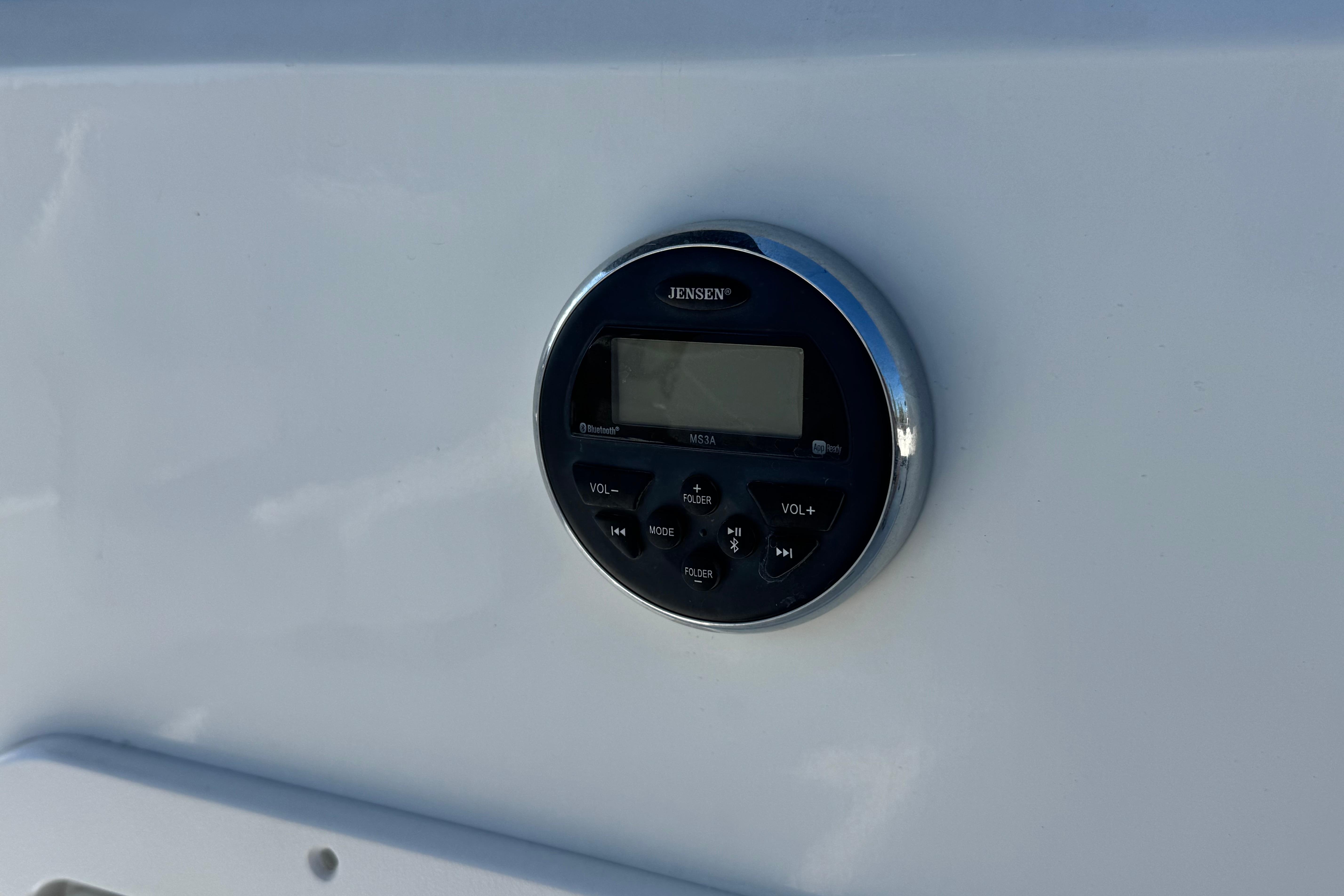 Jensen stereo system on 2019 Tahoe 2150 boat dashboard.