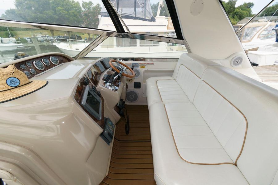 Interior of a 1998 Sea Ray Sundancer 370 yacht with helm console.