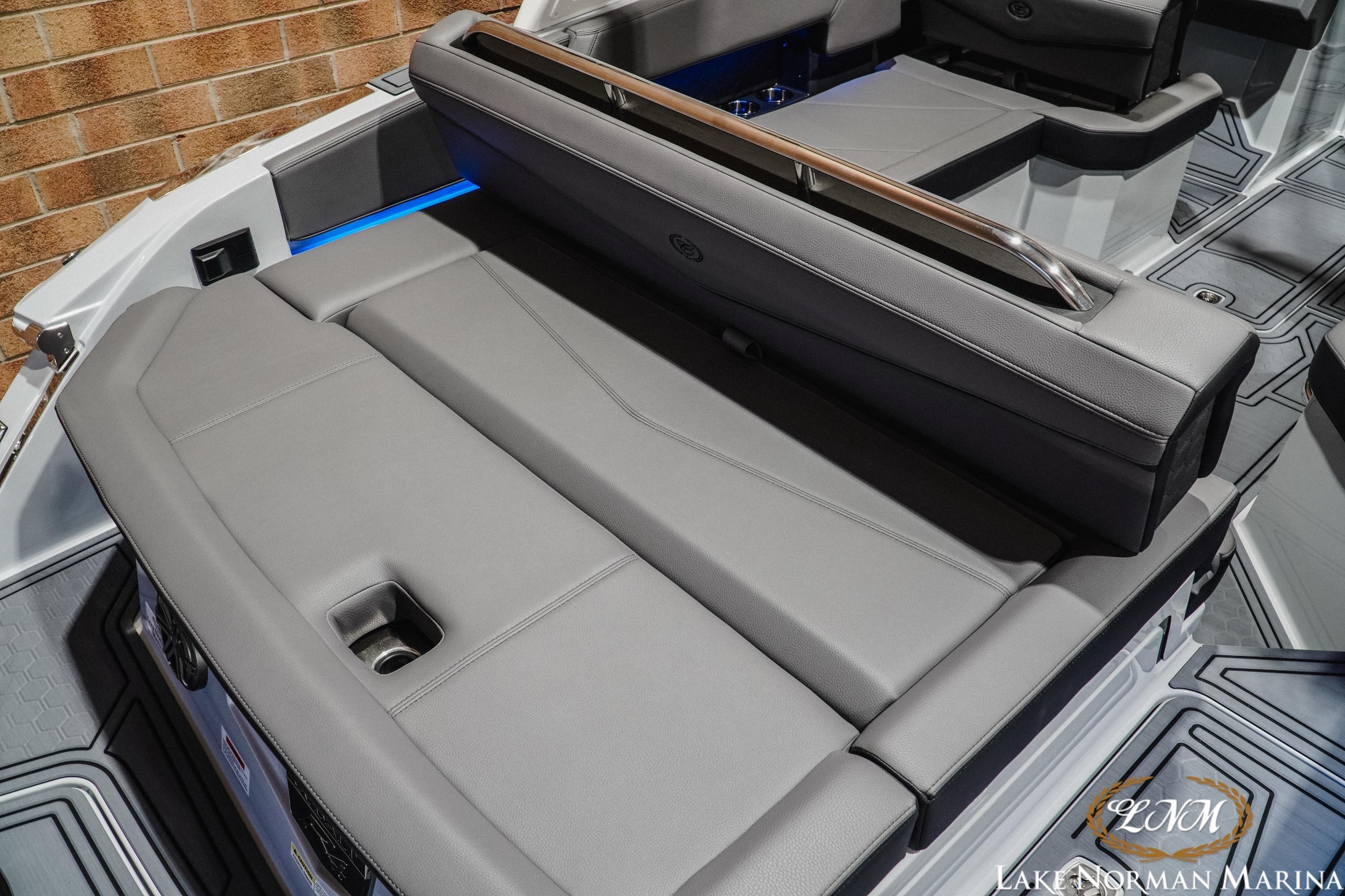 2026 Cobalt R4 Surf boat interior with sleek gray seating and modern design.