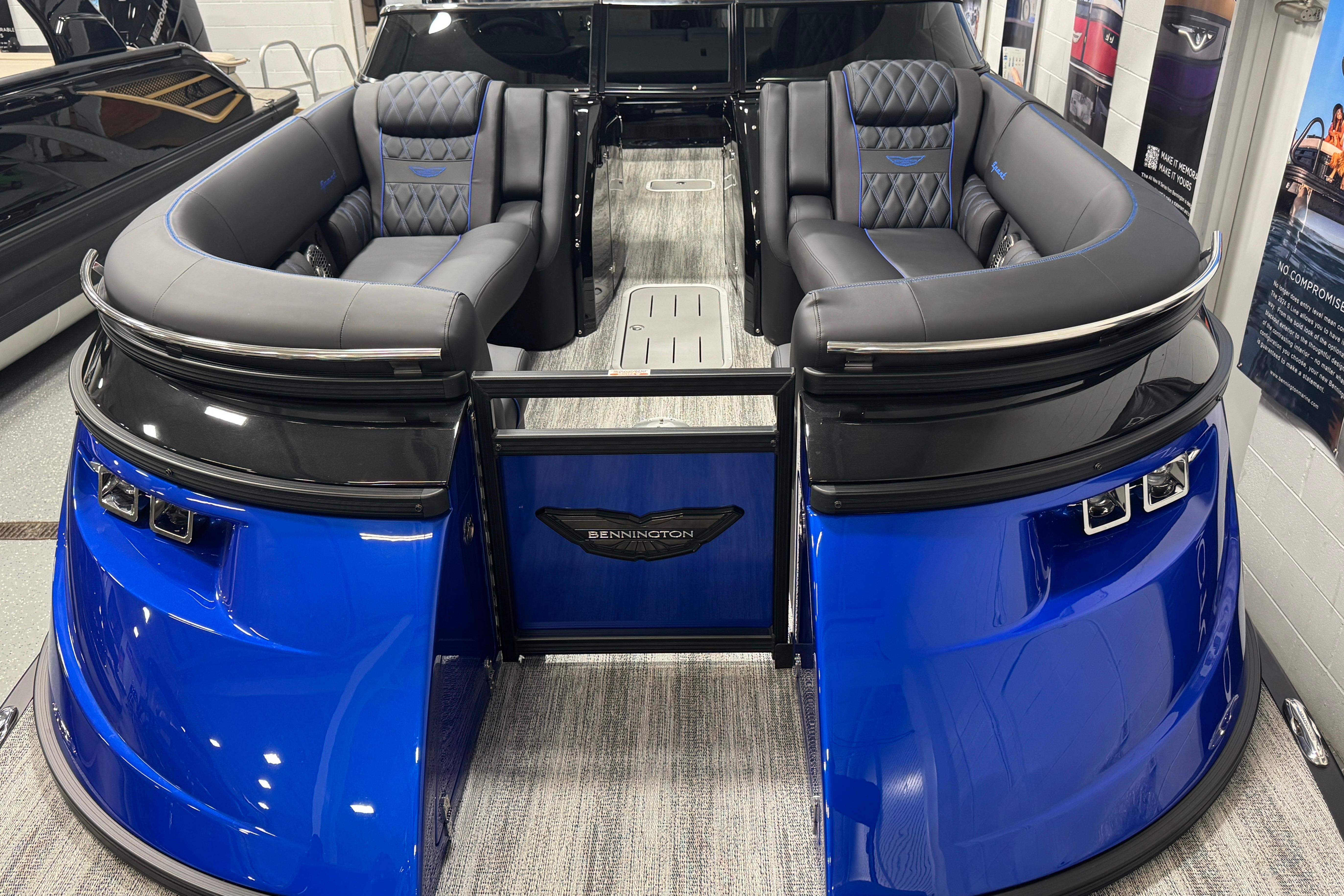 2026 Bennington 25 QSBWASE pontoon boat with luxurious seating and sleek blue design.
