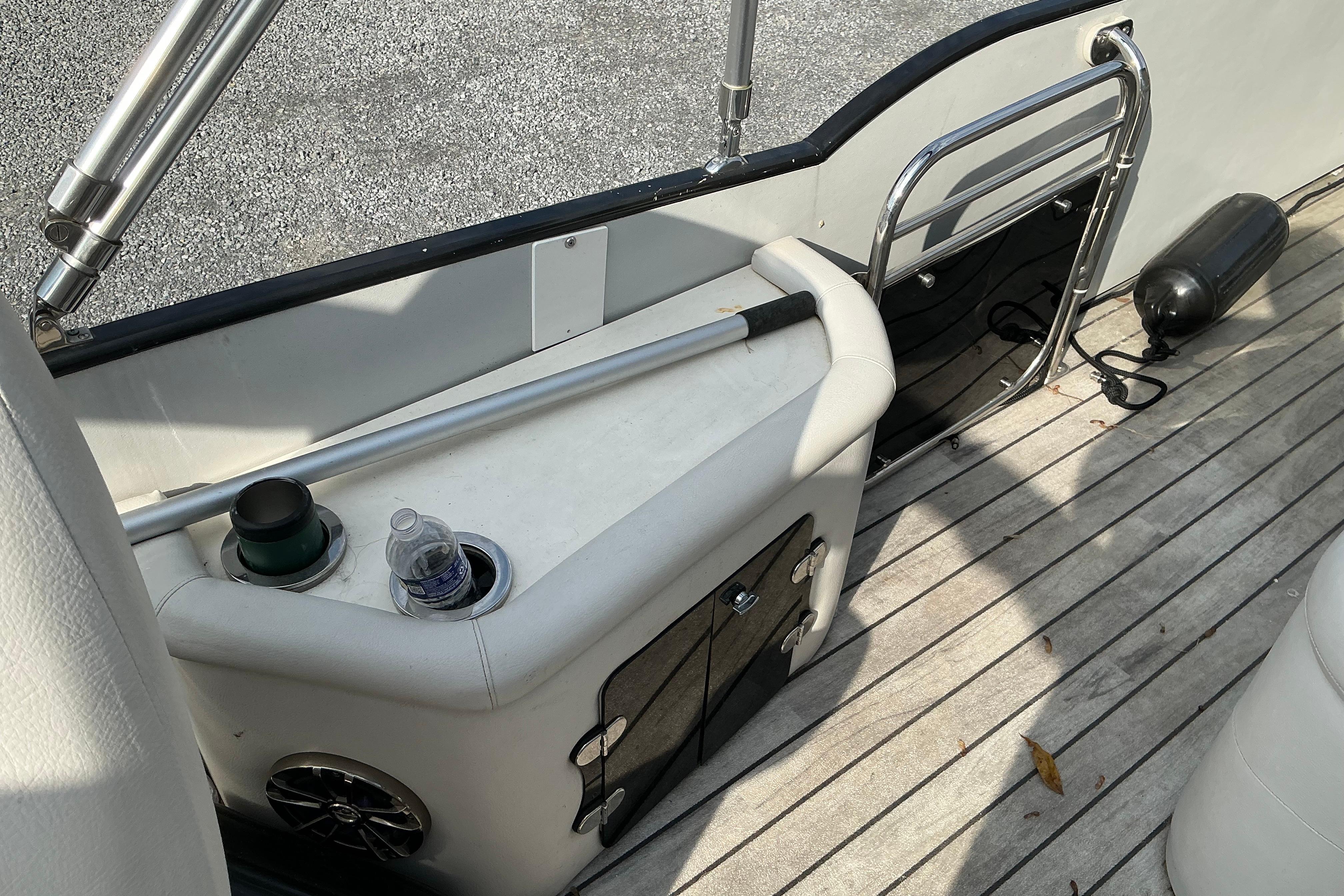 2014 Avalon 25 ft. Paradise Elite boat interior with seating and storage compartments.