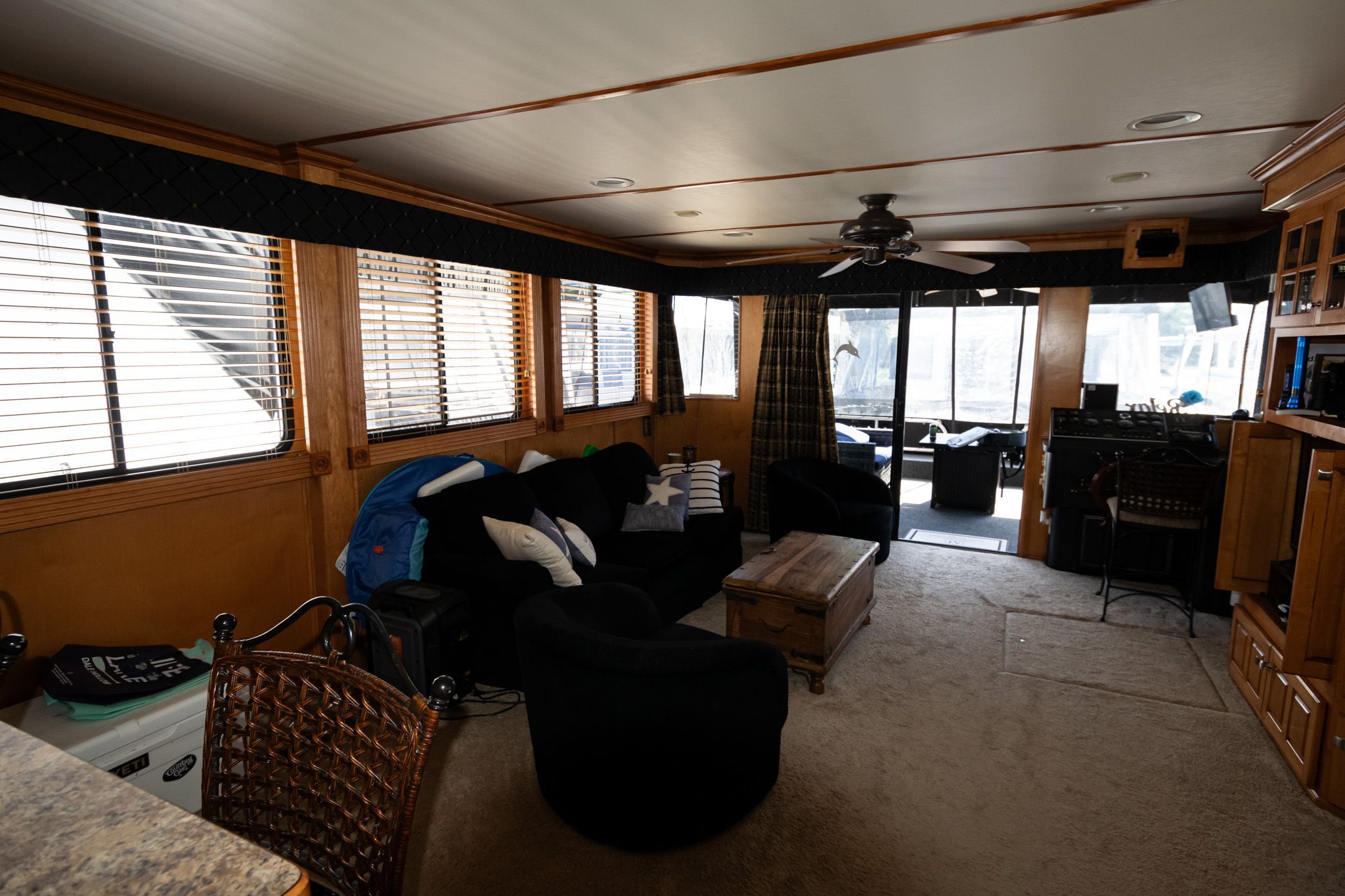 Interior of a 2003 Lakeview 16x70 houseboat with cozy living room.