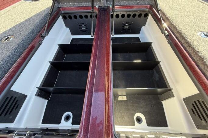 2026 Nitro Z21 XL Pro boat storage compartments, open and empty, showcasing organized space.