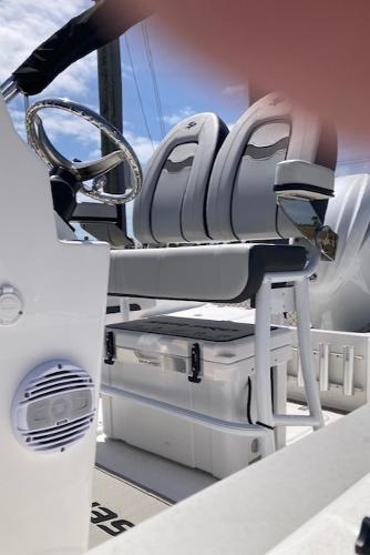 2025 Sea Pro 202 Center Console boat interior with dual seats and steering wheel.