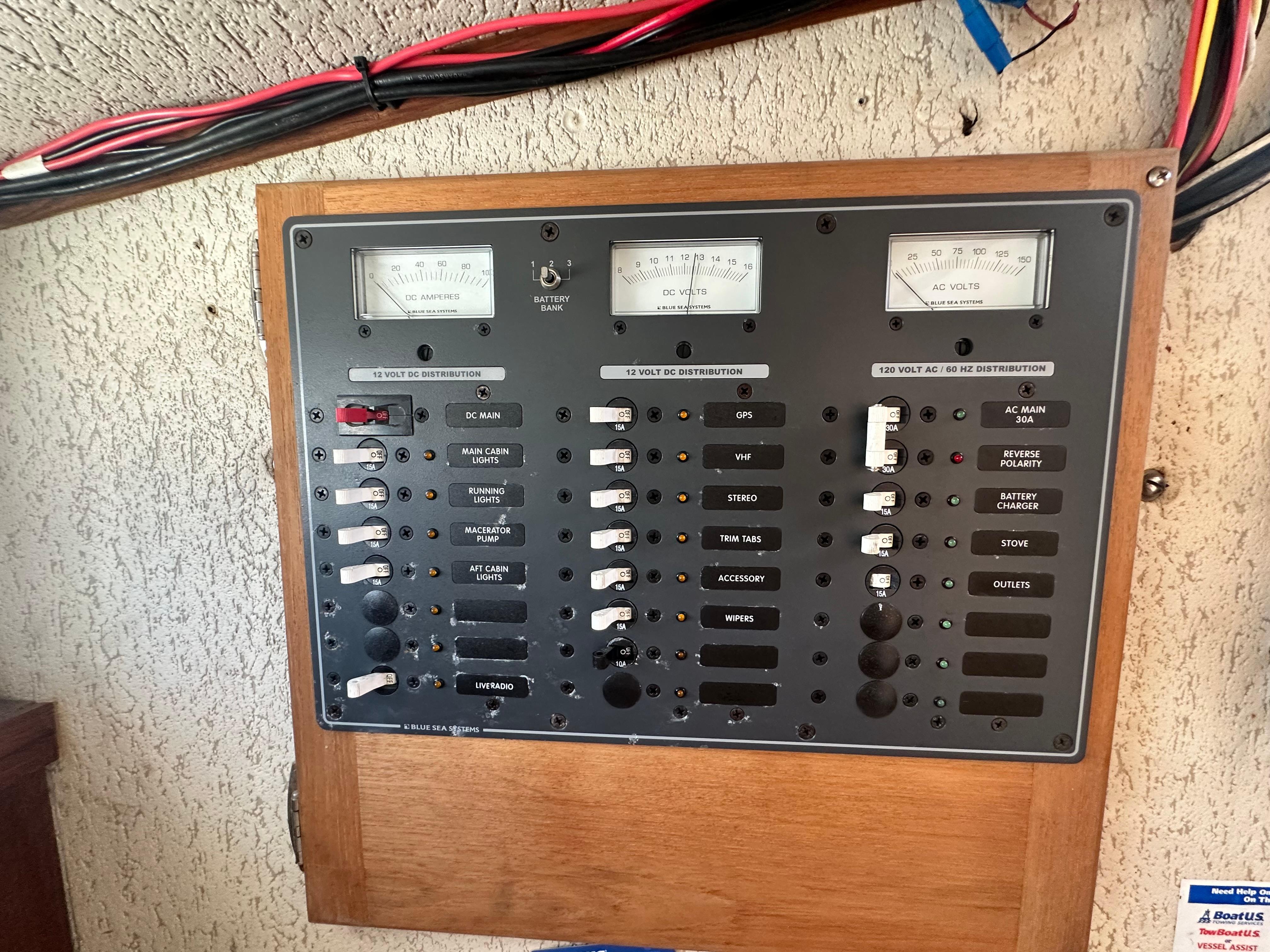 Electrical panel on a 1979 Fortier 26 boat, featuring various switches and meters.