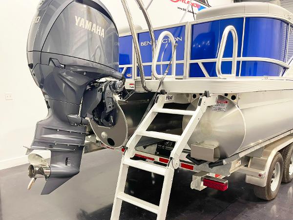 2025 Bennington 20S pontoon boat with Yamaha outboard motor and boarding ladder.