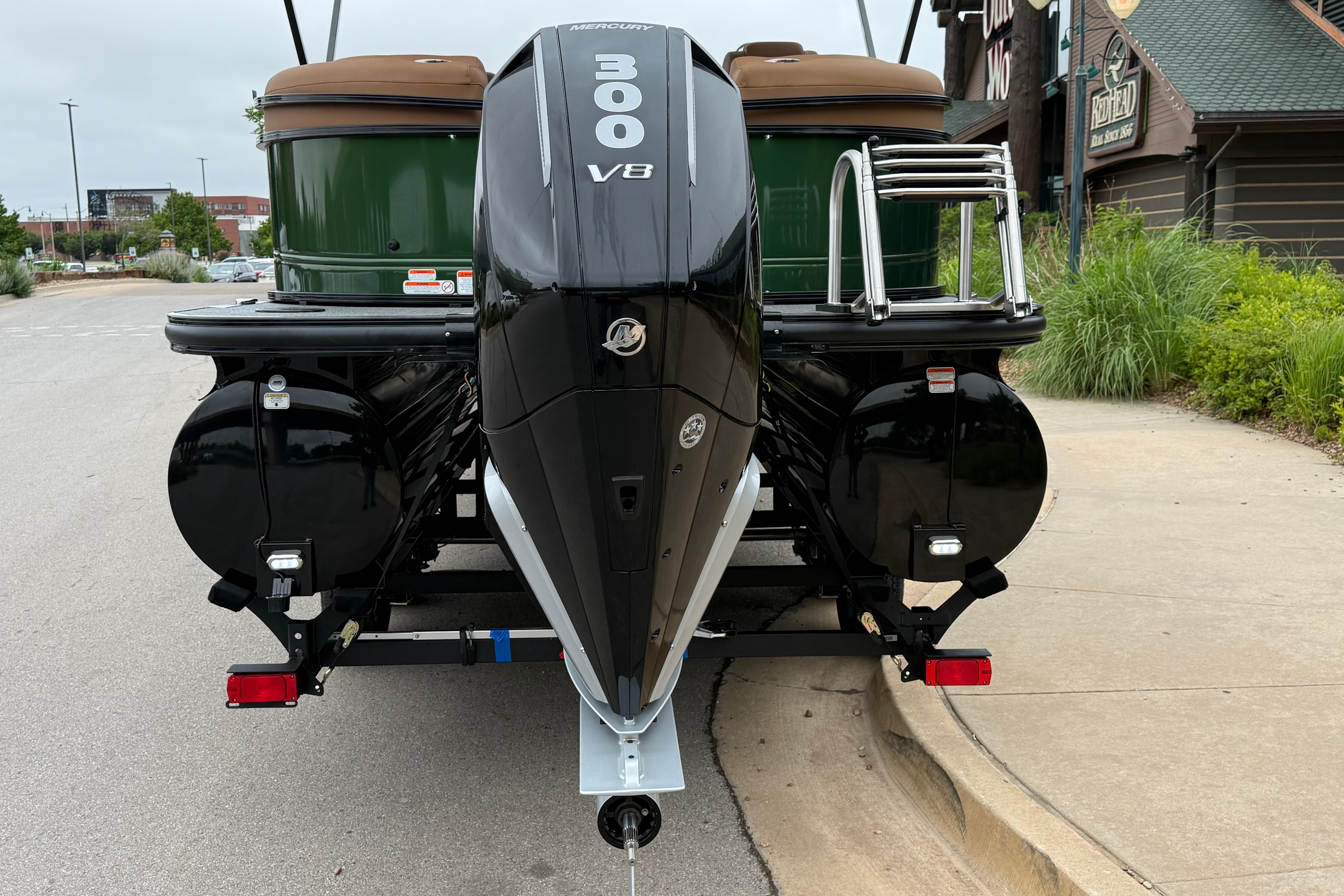 Rear view of a 2026 Regency 250 DL boat with a Mercury 300 V8 engine.